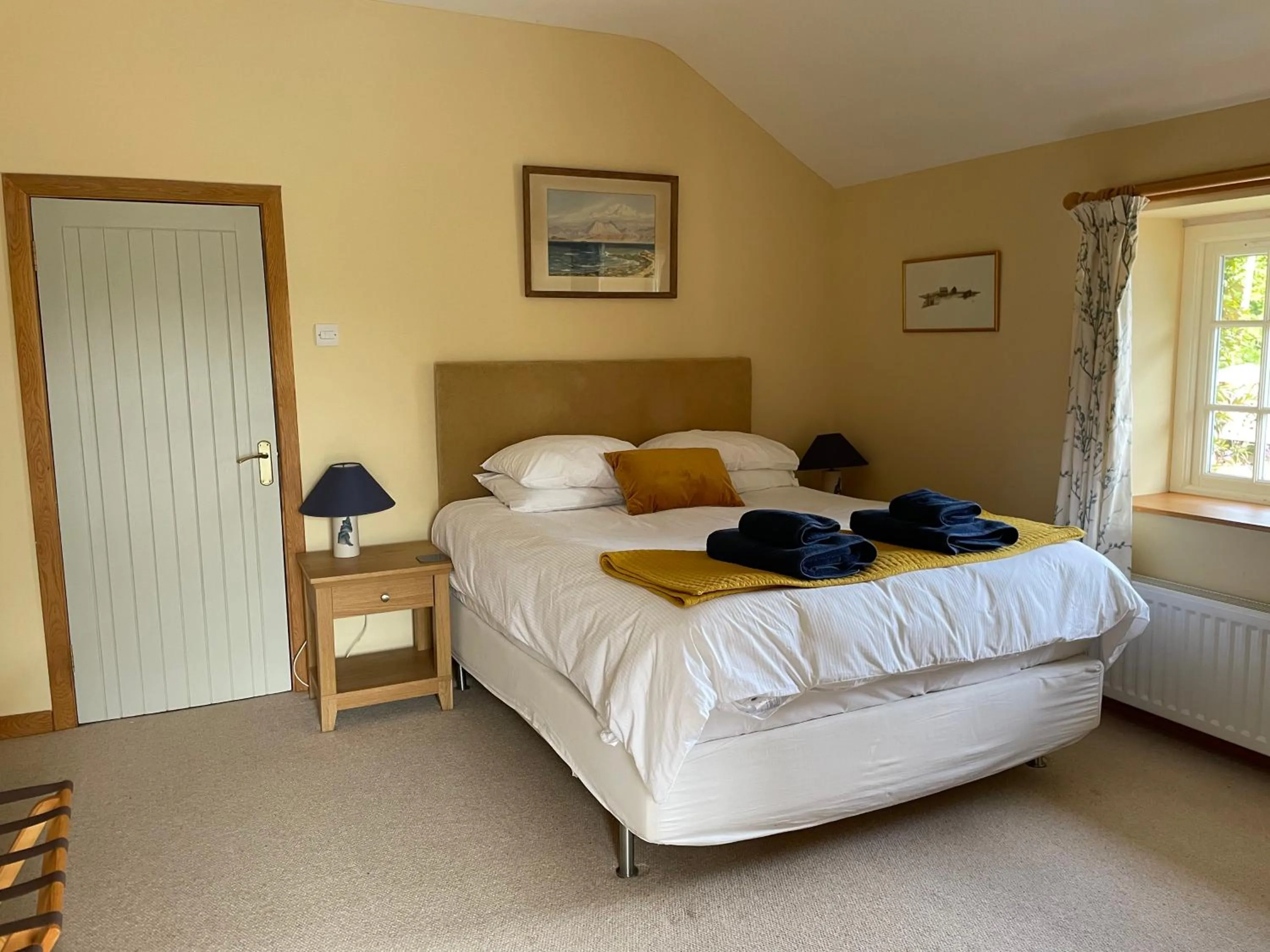 Bed in Coachman's at Claremont Cottage