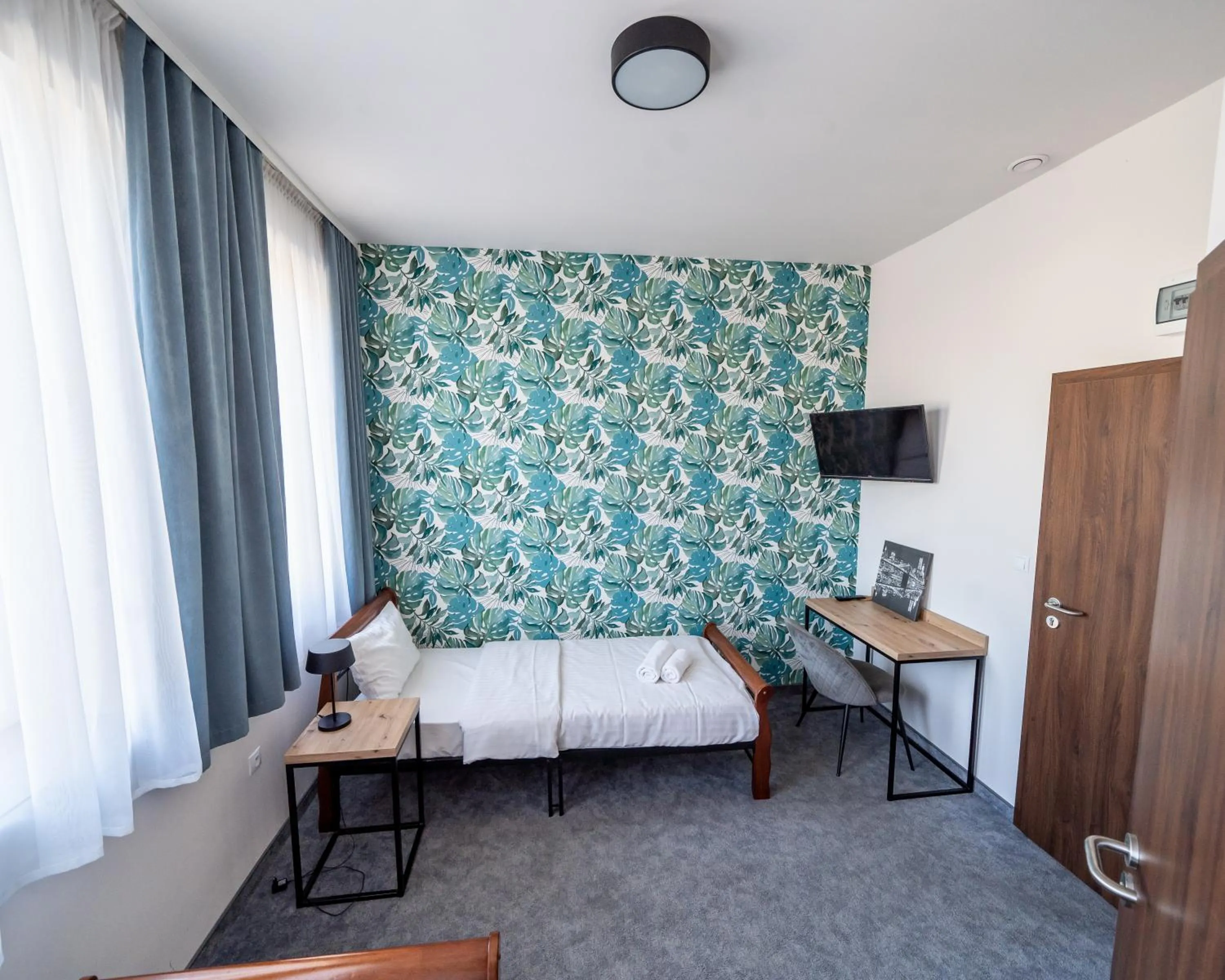 Photo of the whole room, Bed in Kelman Inn Global Nowa Sól