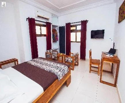 Bed in Hotel le Pelican