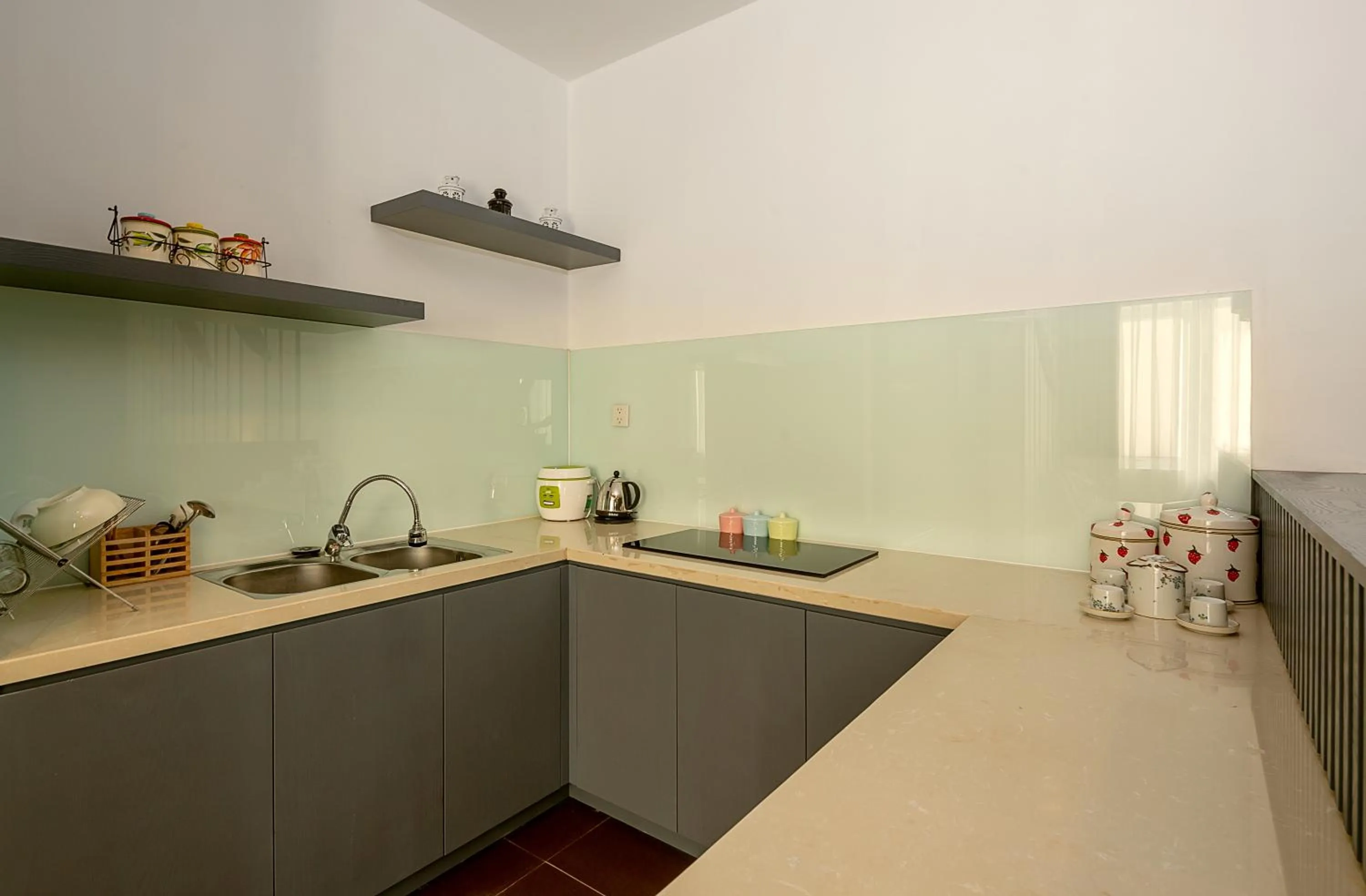 Kitchen or kitchenette in Le House Boutique Hotel - 100m to the beach