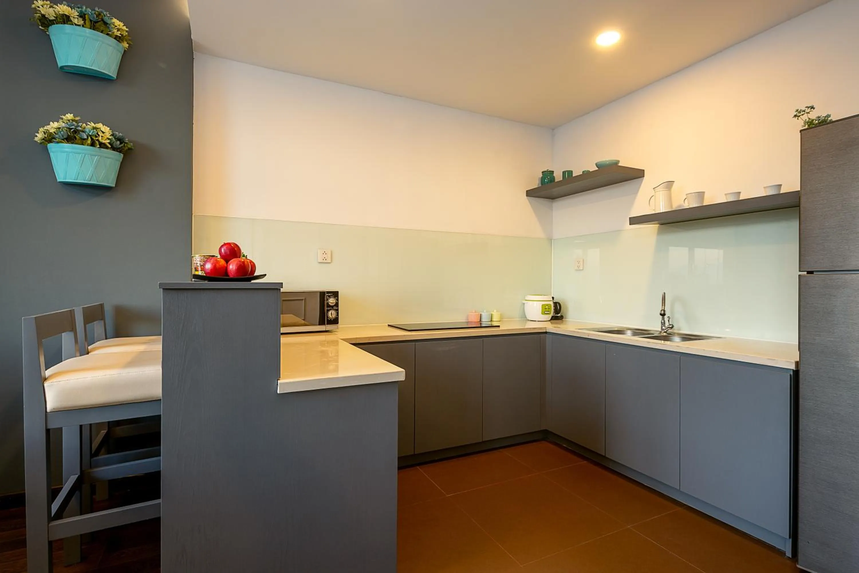 Kitchen or kitchenette in Le House Boutique Hotel - 100m to the beach