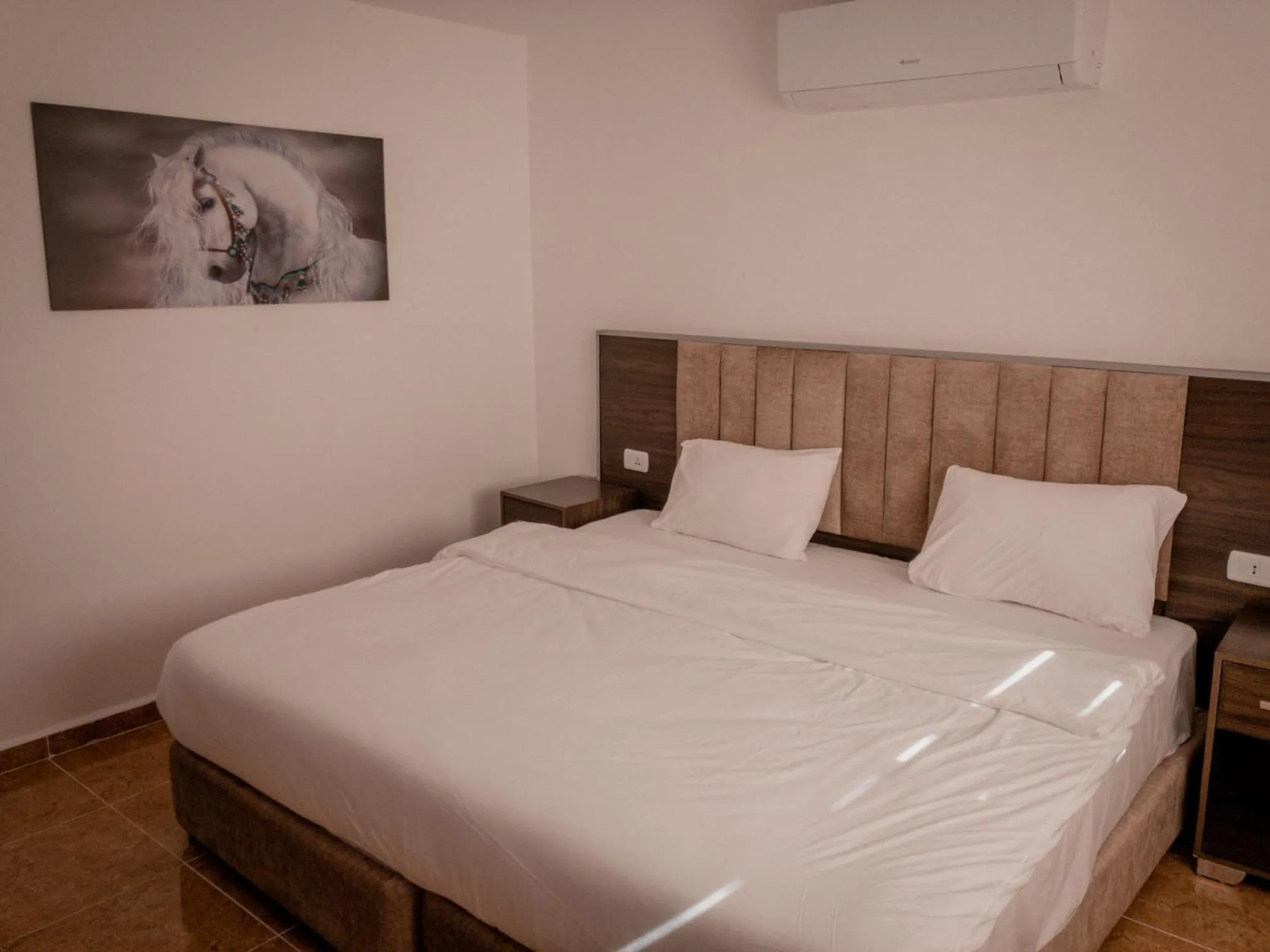 Bed in Petra Jewel Hotel