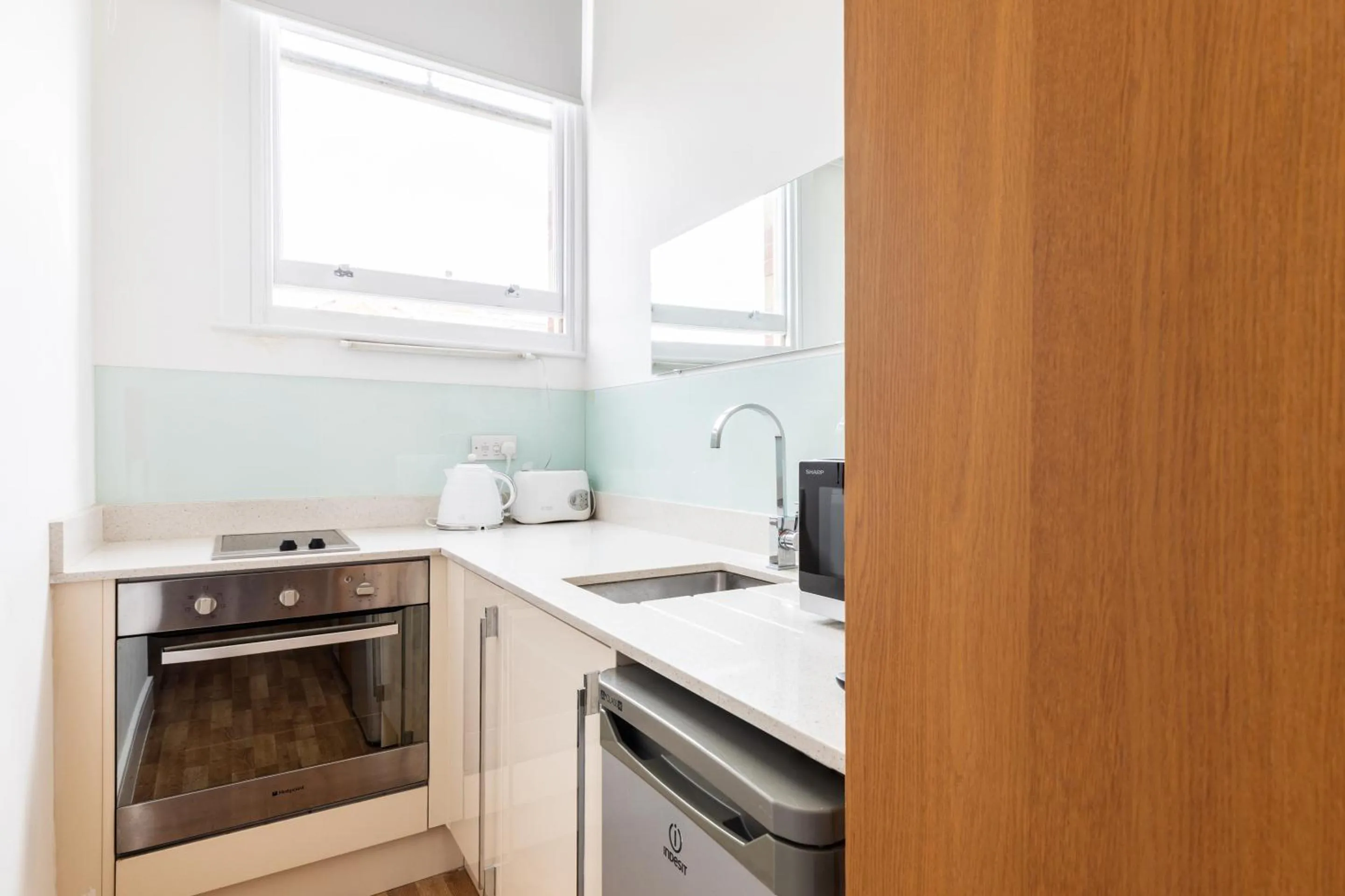Kitchen or kitchenette in Kensington High Street Suites
