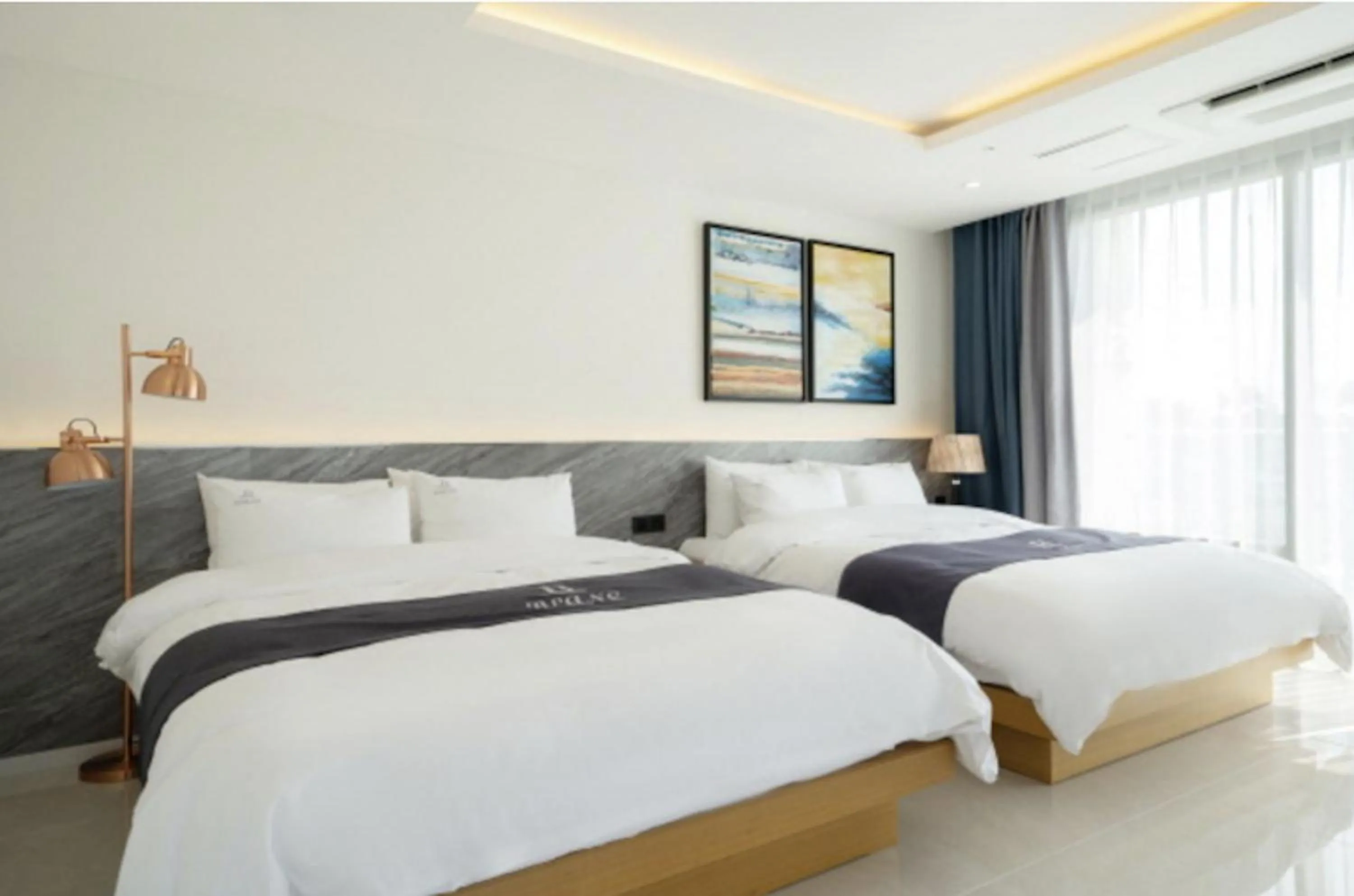 Bed in Blanc Hotel & Resort