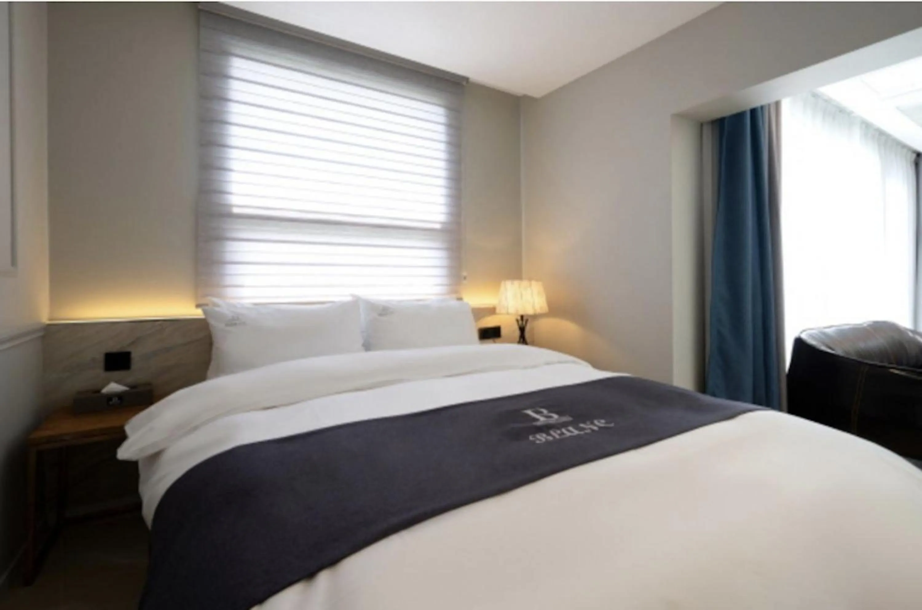 Bed in Blanc Hotel & Resort