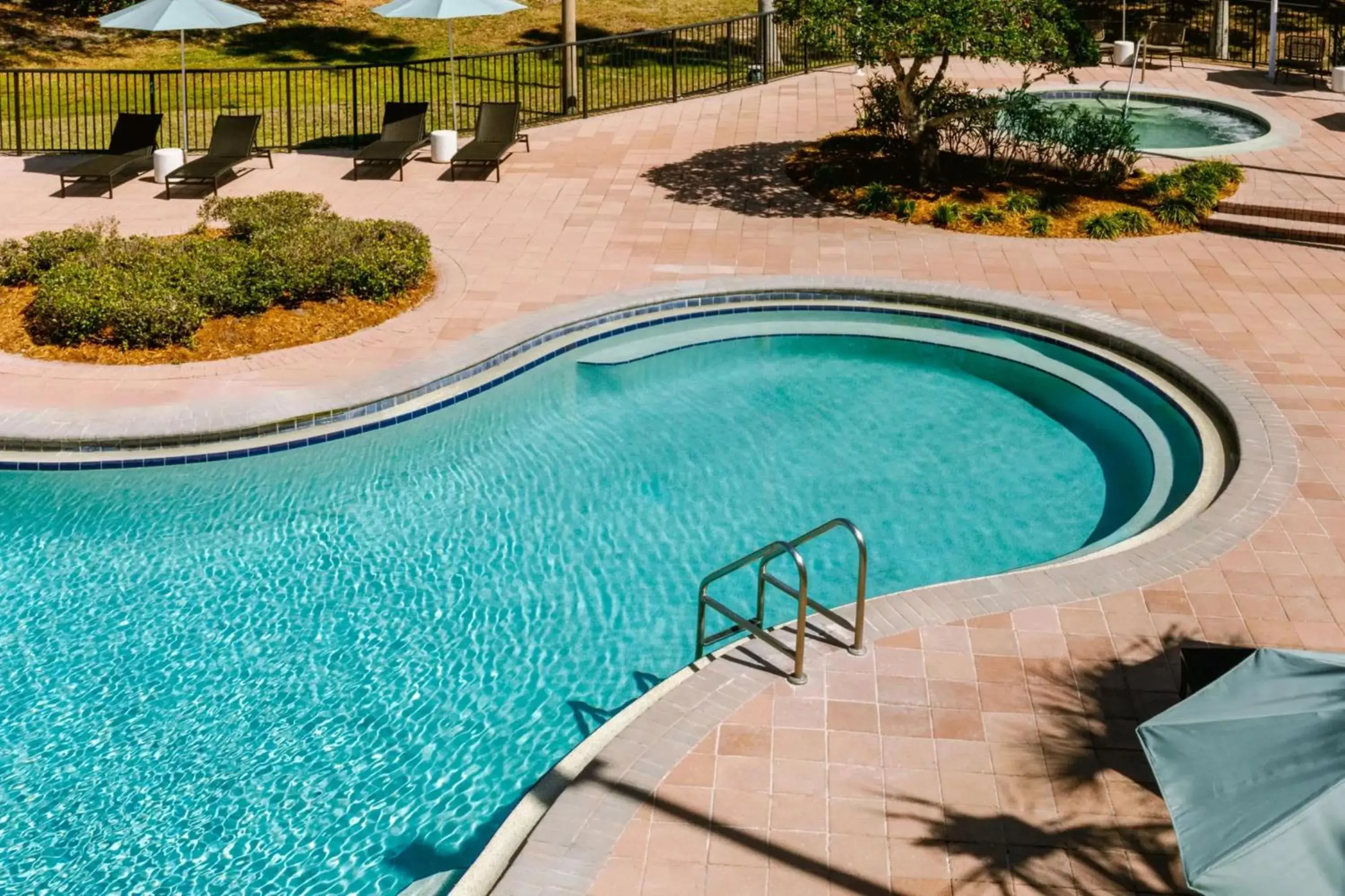 Swimming pool in voco Kissimmee Orlando by IHG Swimming pool in voco Kissimmee Orlando by IHG