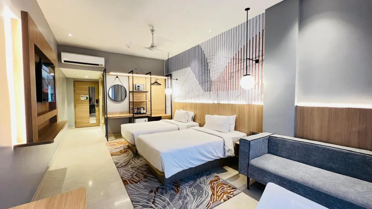 Bed in Hotel Manorama Vijayawada