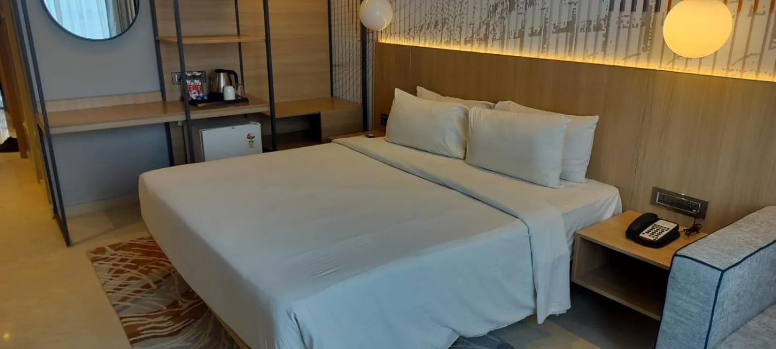 Bed in Hotel Manorama Vijayawada