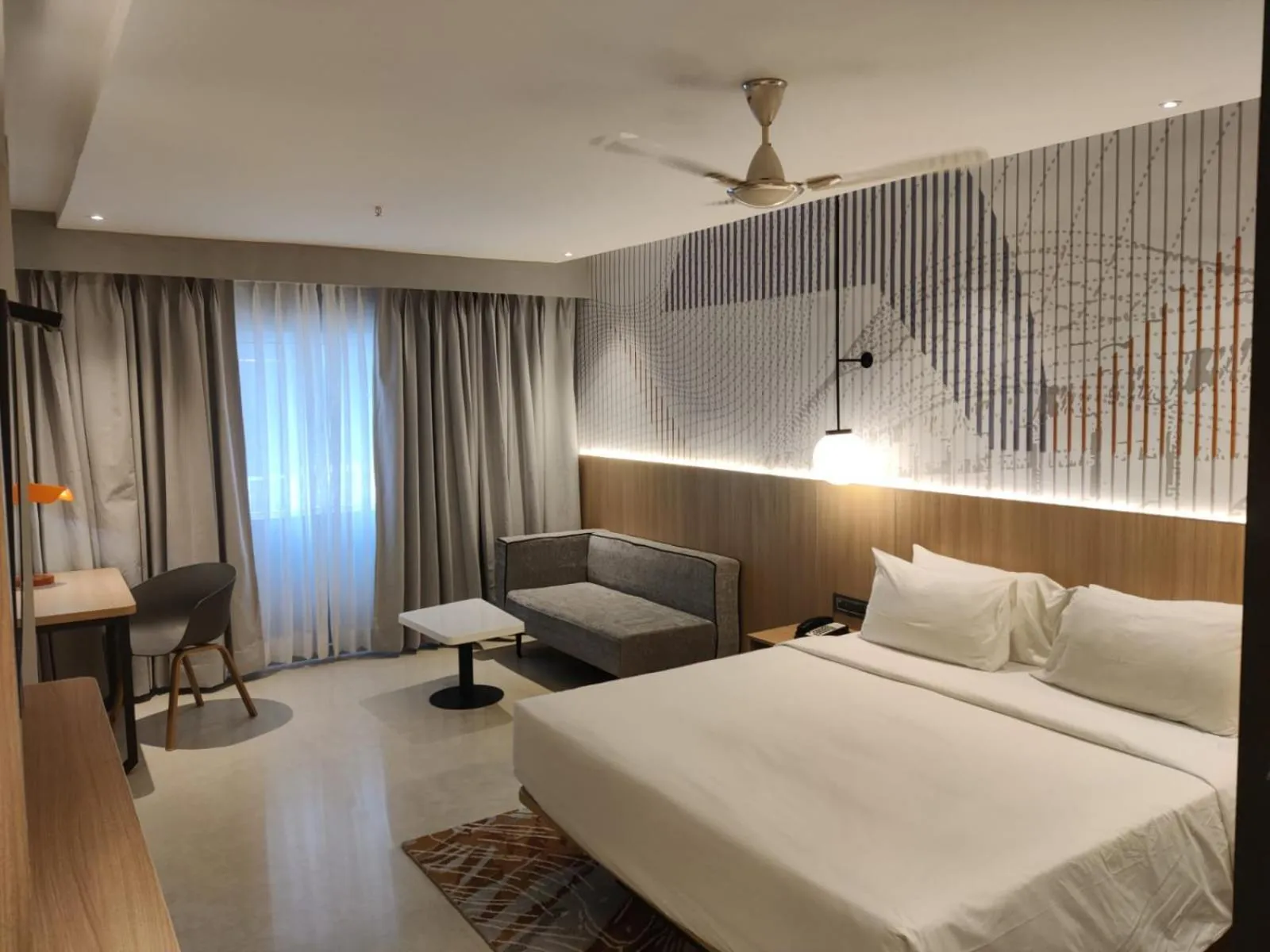 Bed in Hotel Manorama Vijayawada