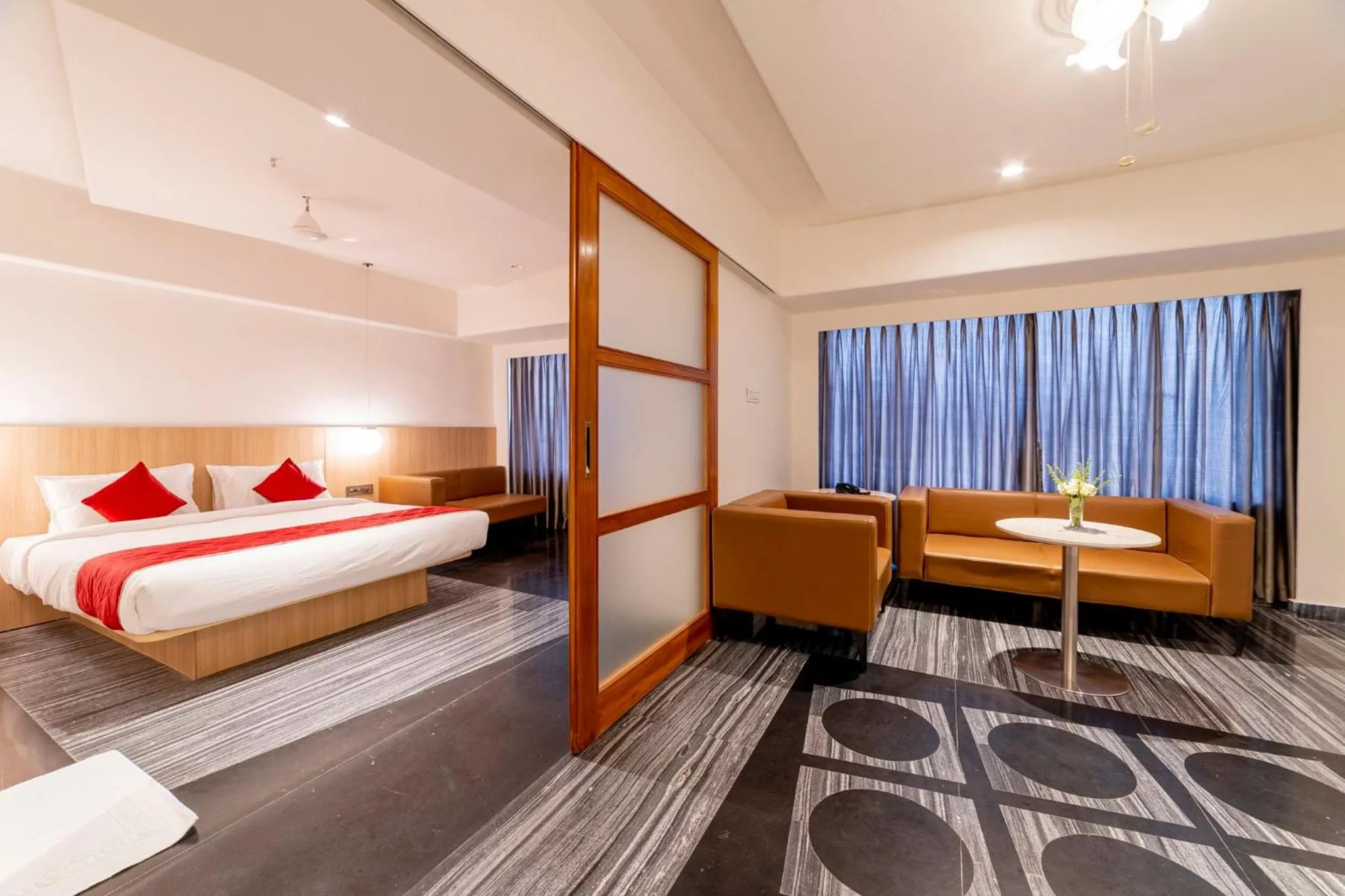 Photo of the whole room, Bed in Hotel Manorama Vijayawada