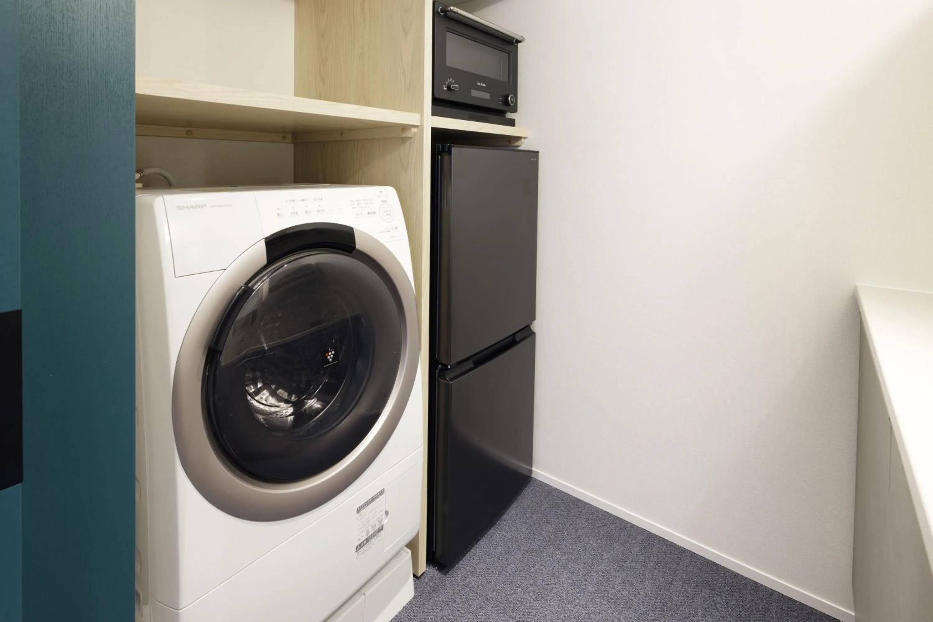 washing machine in Holiday Inn & Suites Sapporo Odori Park by IHG