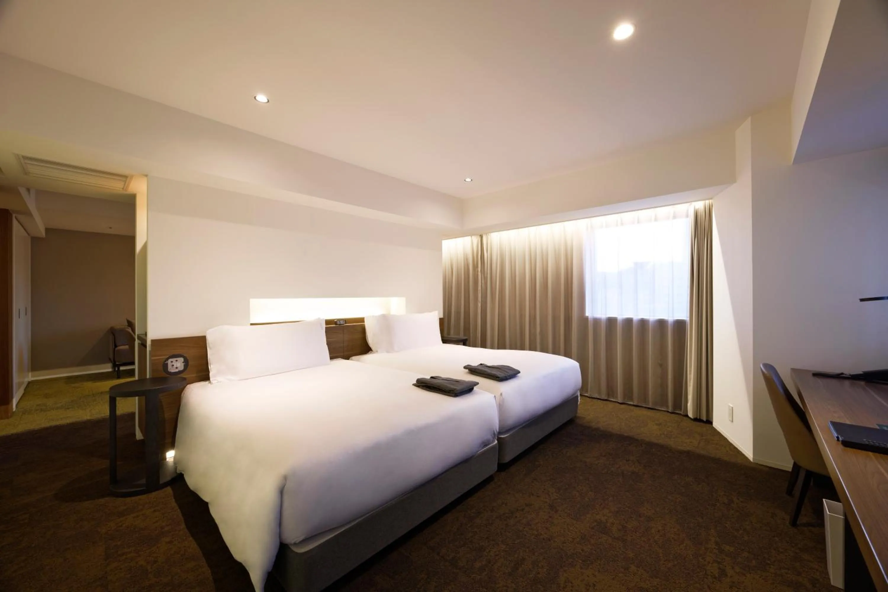 Bed in Holiday Inn & Suites Sapporo Odori Park by IHG