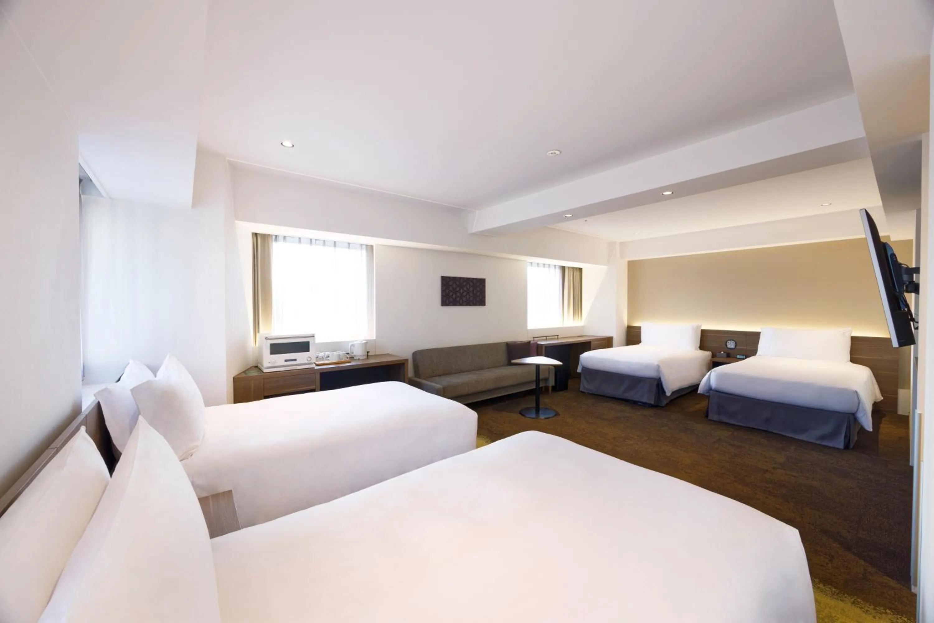 Bed in Holiday Inn & Suites Sapporo Odori Park by IHG