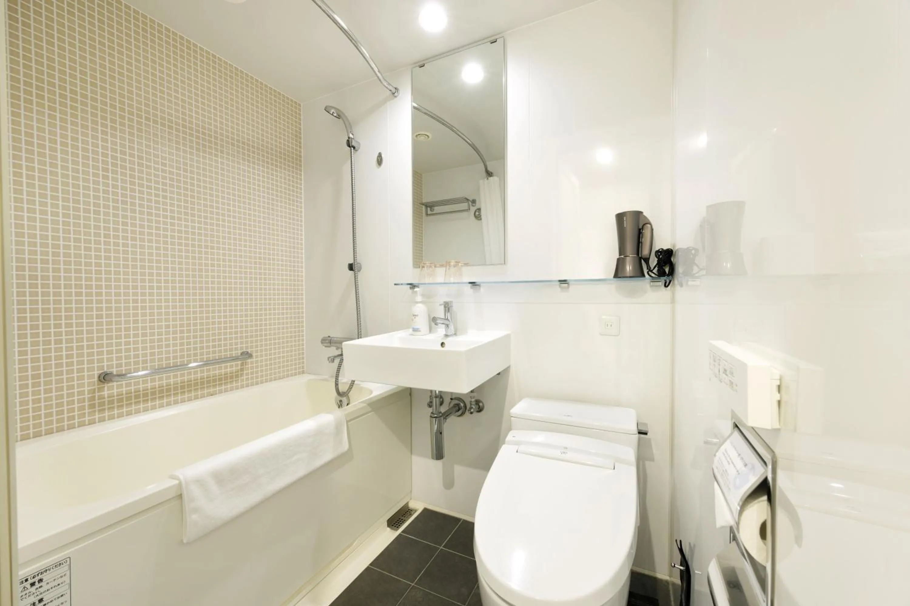 Toilet in Holiday Inn & Suites Sapporo Odori Park by IHG