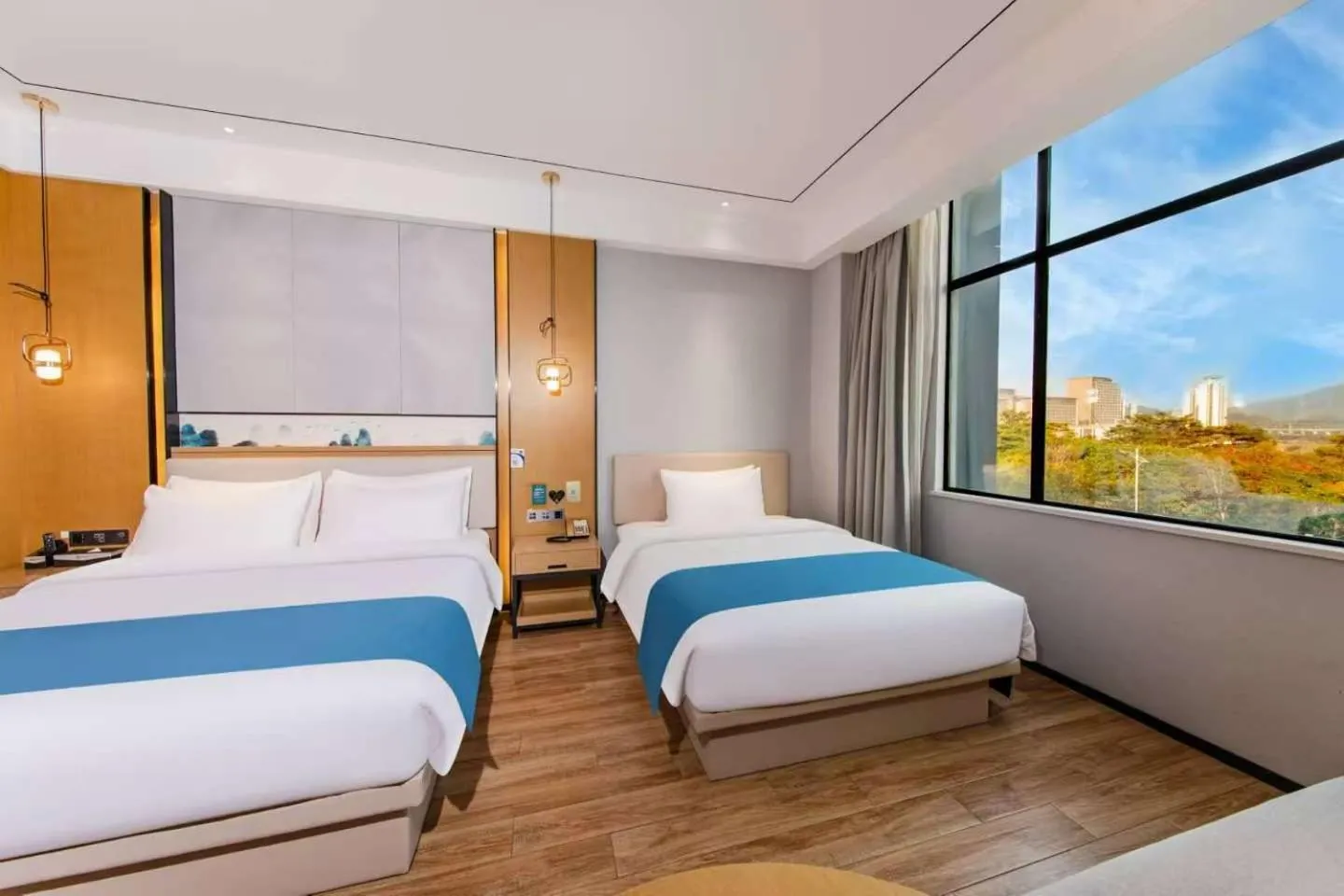 Bed in Boman International Hotel
