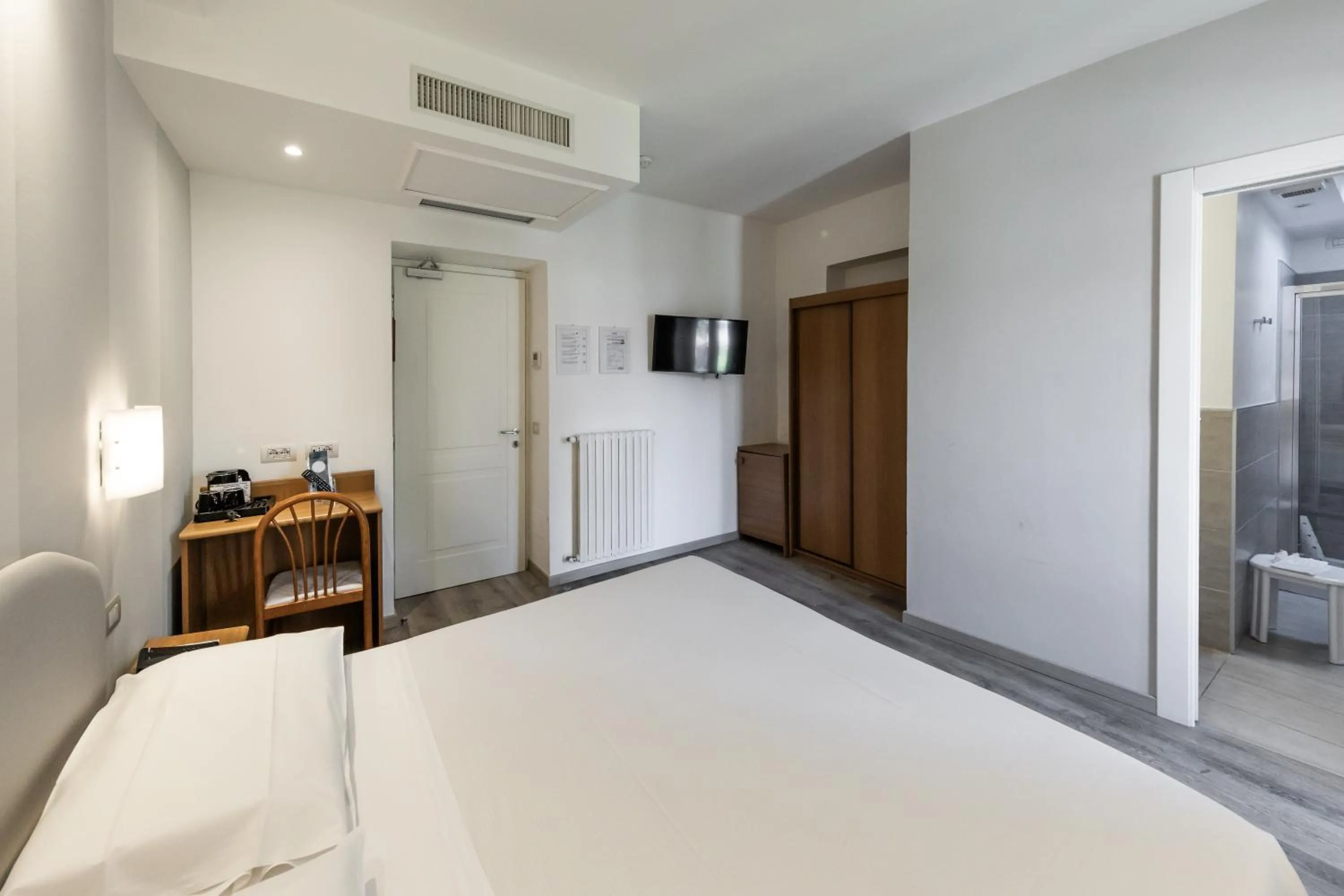 Bed in Hotel Beau Rivage