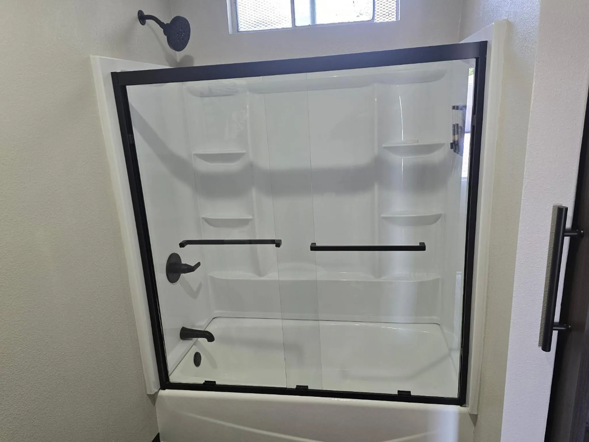 Shower in The Atlas Inn & Suites LAX