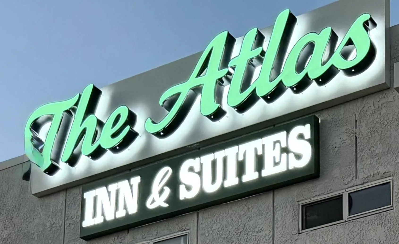 Logo/Certificate/Sign in The Atlas Inn & Suites LAX