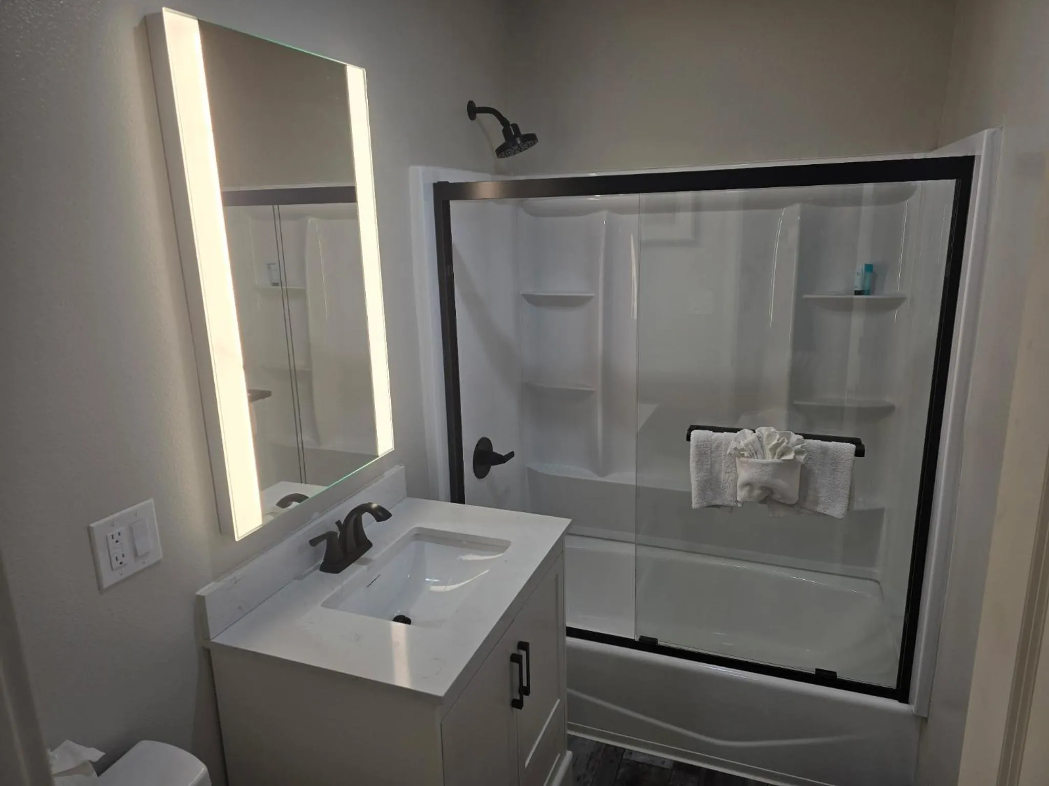 Shower in The Atlas Inn & Suites LAX