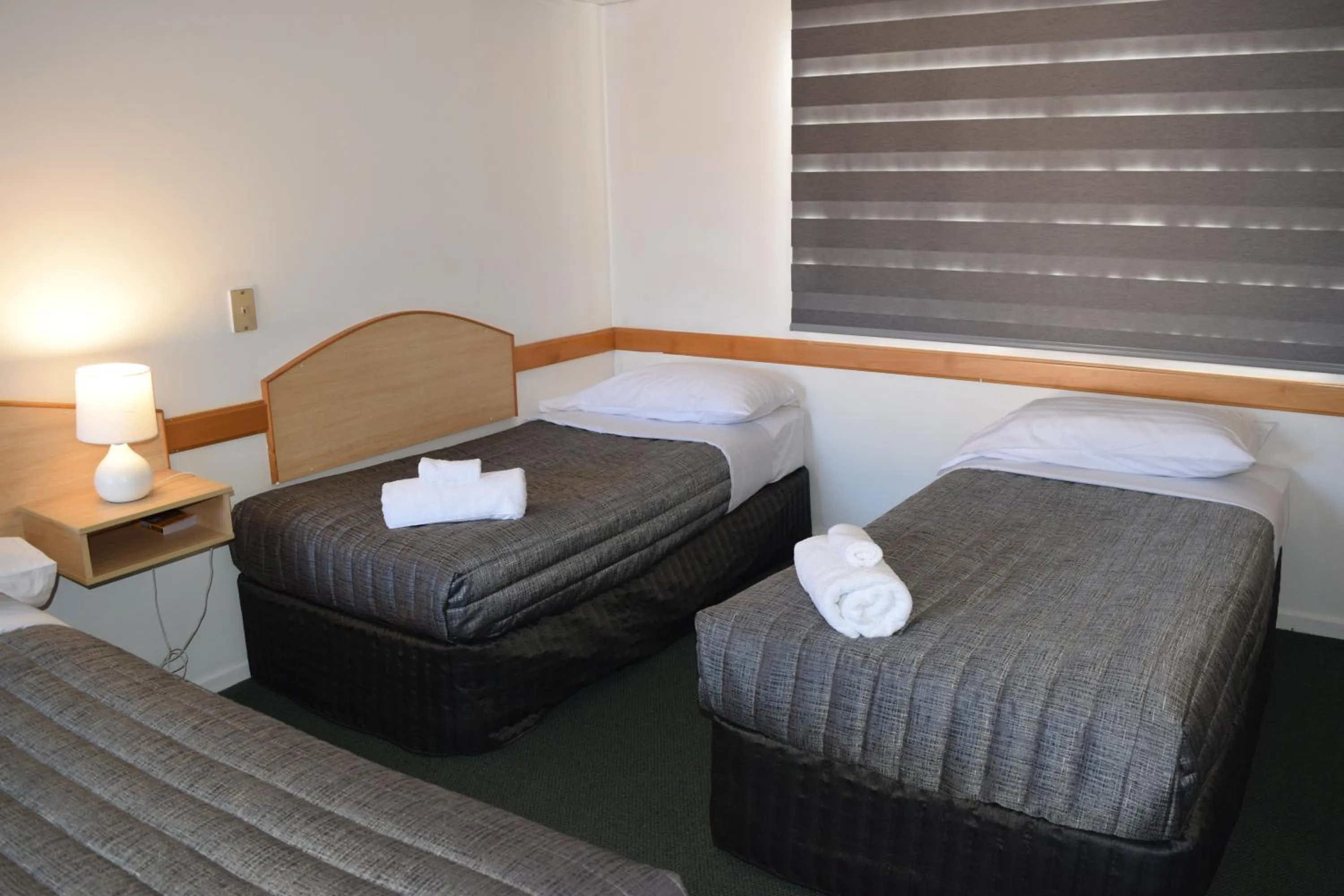 Bed in Warwick Vines Motel