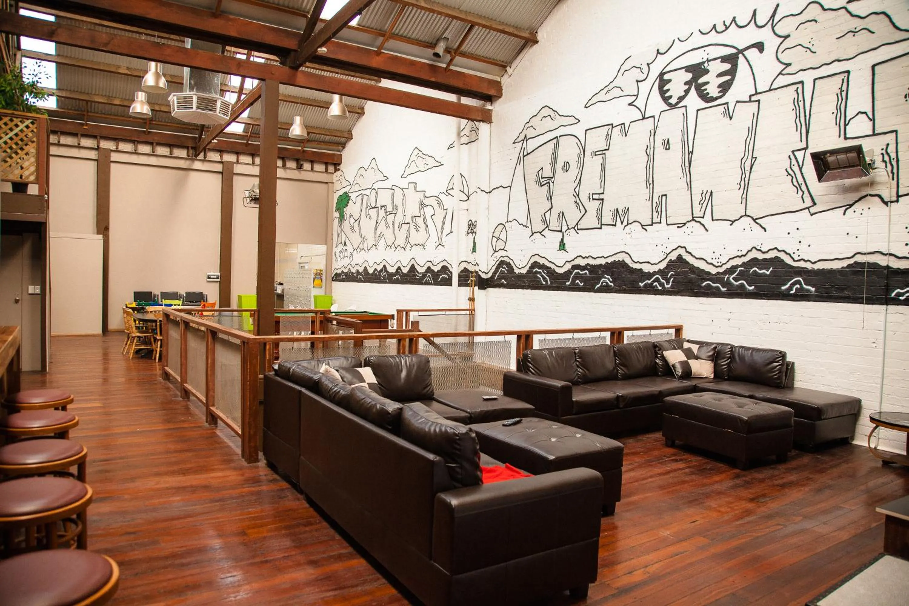 Communal lounge/ TV room, Seating Area in Fremantle Hostel