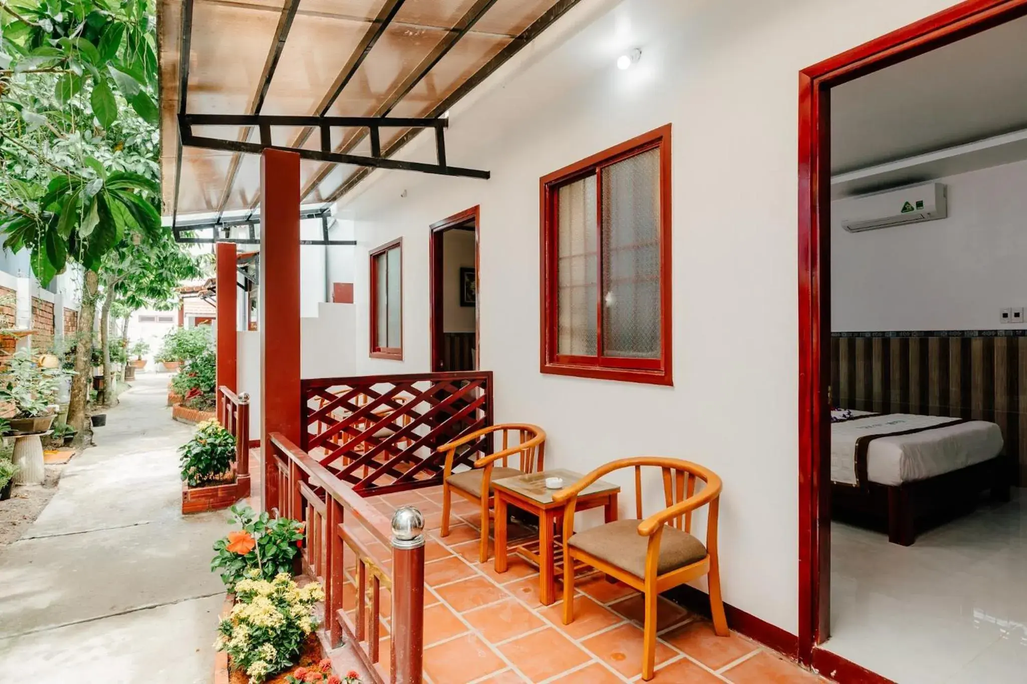 Quadruple Room with Garden View in Ngoc Qui Bungalow Quadruple Room with Garden View in Ngoc Qui Bungalow