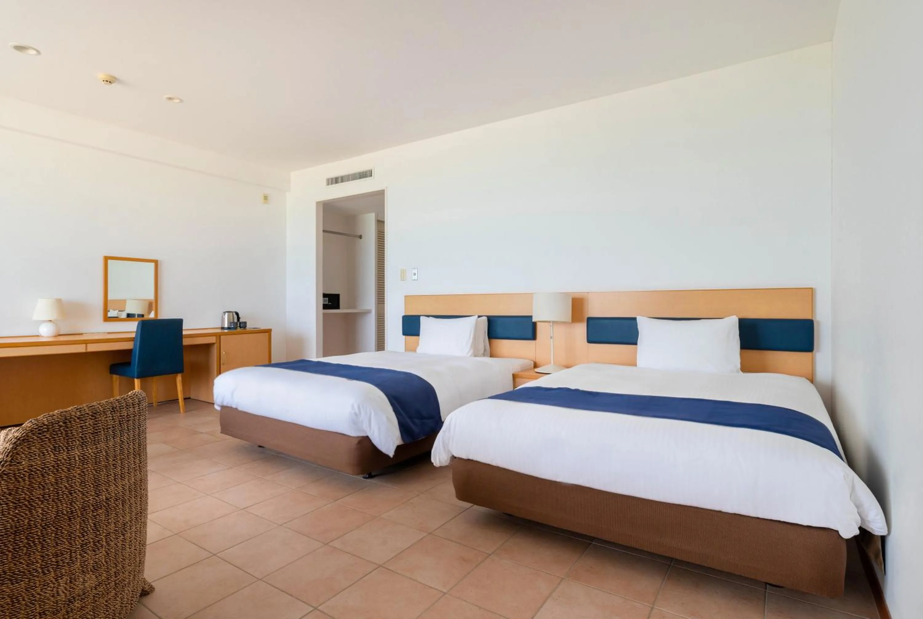 Photo of the whole room, Bed in EN RESORT Kumejima EEF Beach Hotel