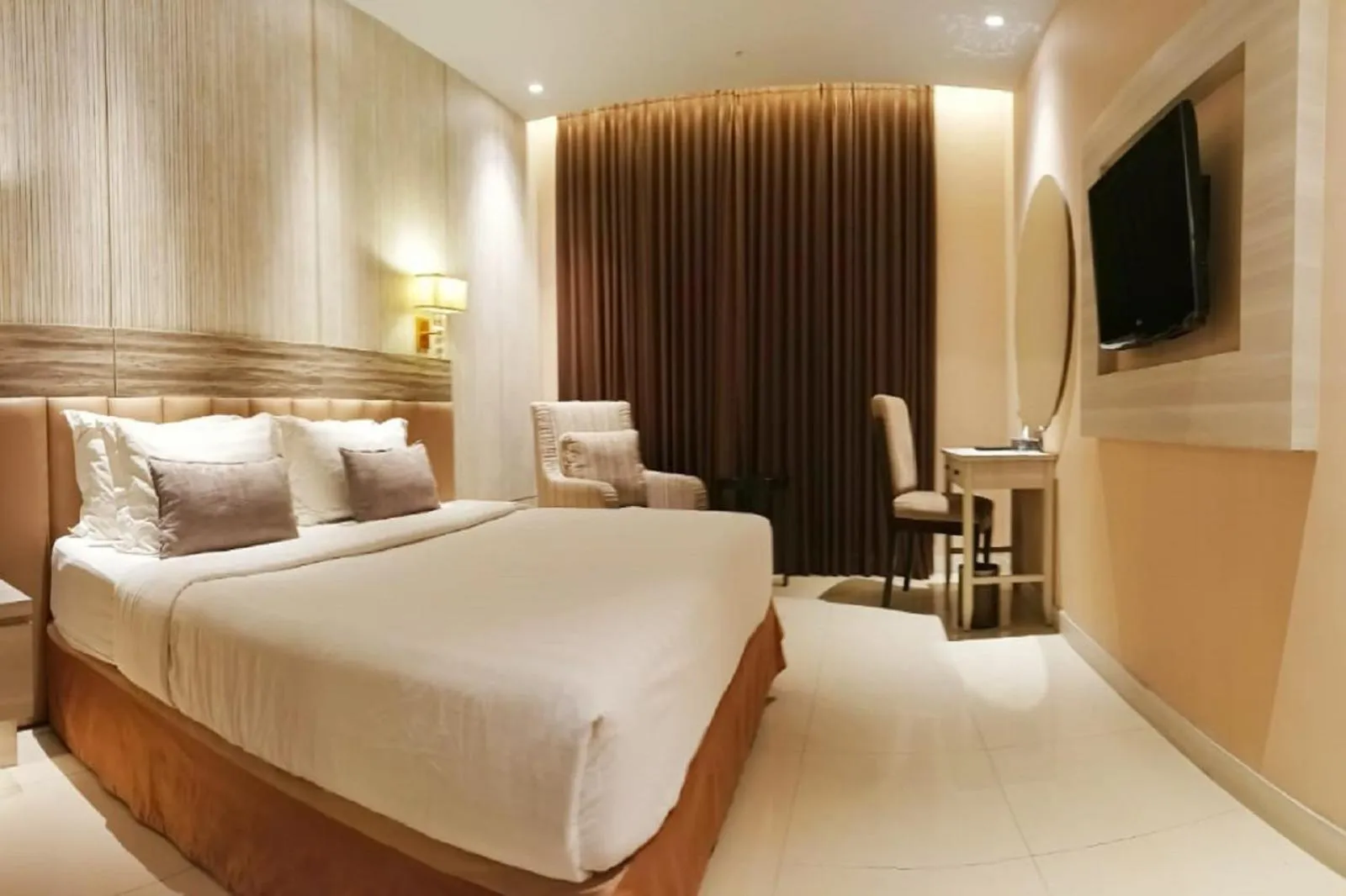 Bed in Grand Paragon Hotel