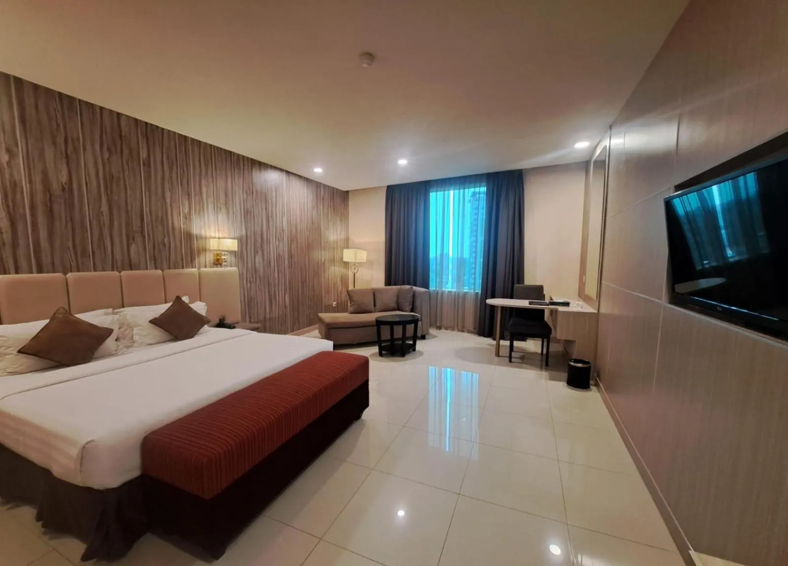 Bed in Grand Paragon Hotel