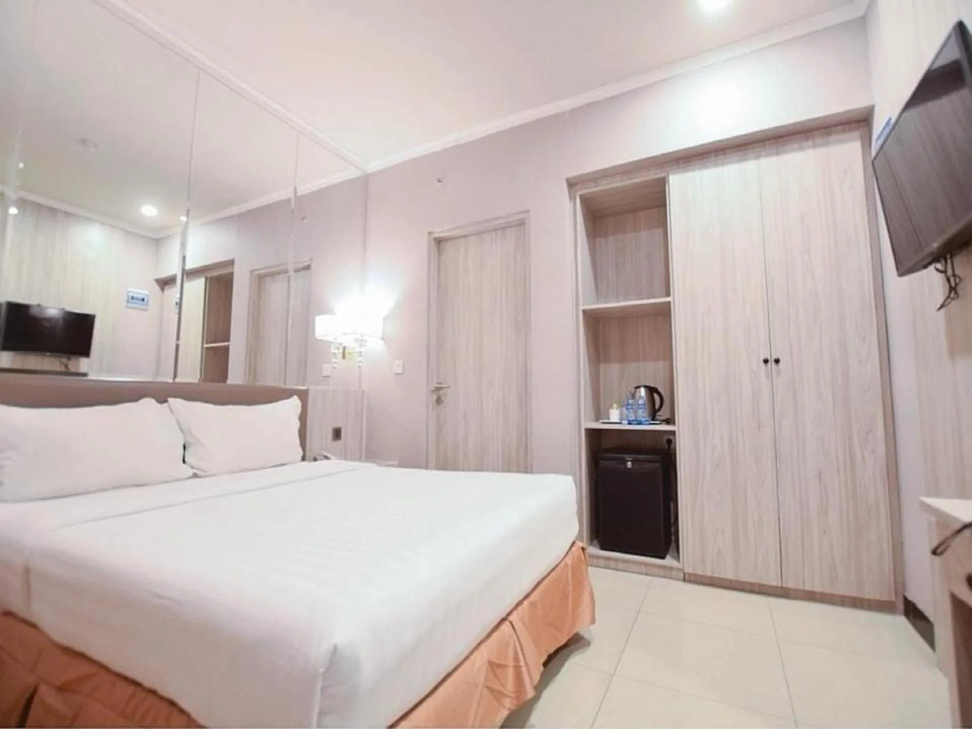 Bed in Grand Paragon Hotel