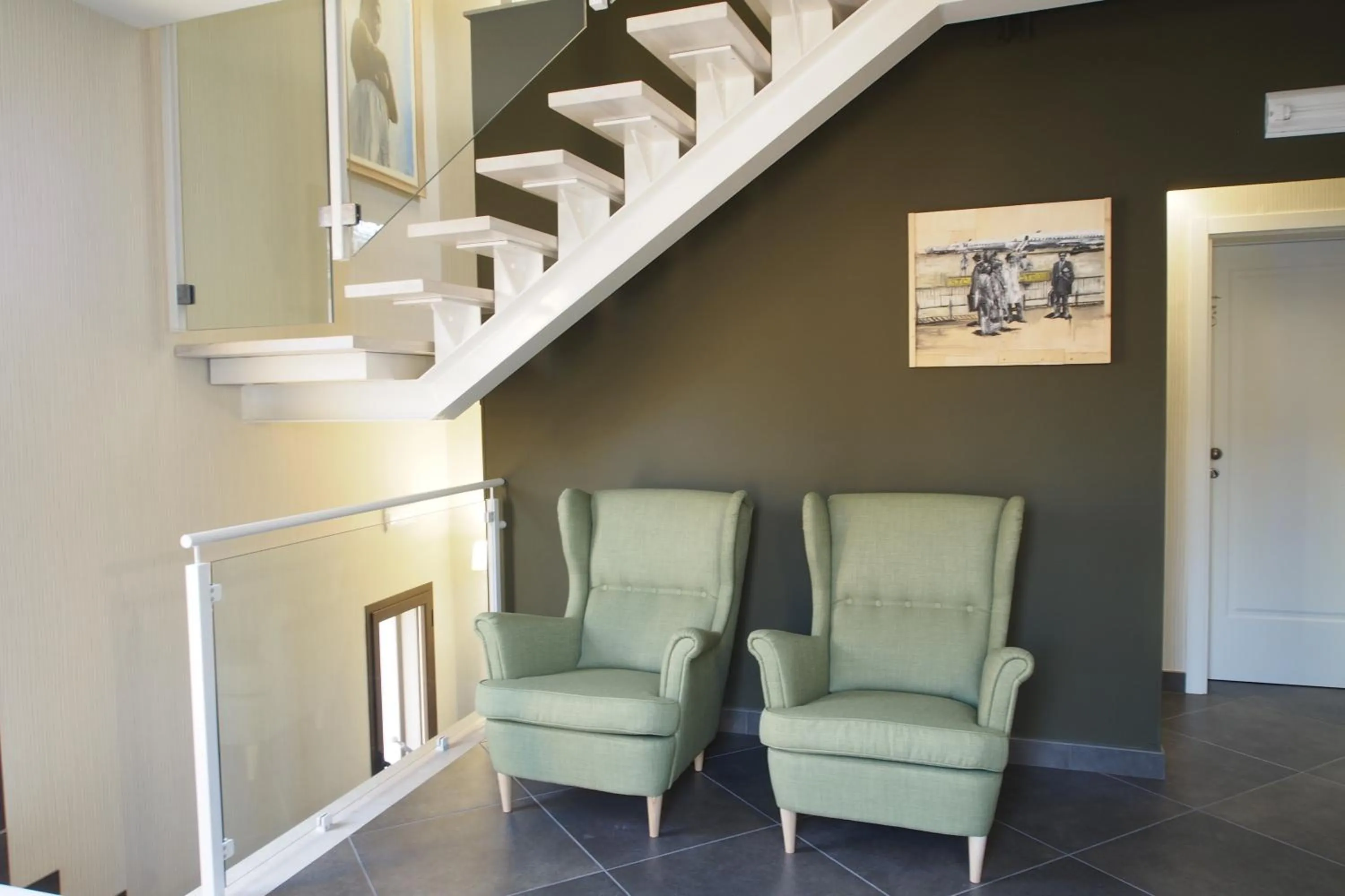 Communal lounge/ TV room in Terrazzani Suite