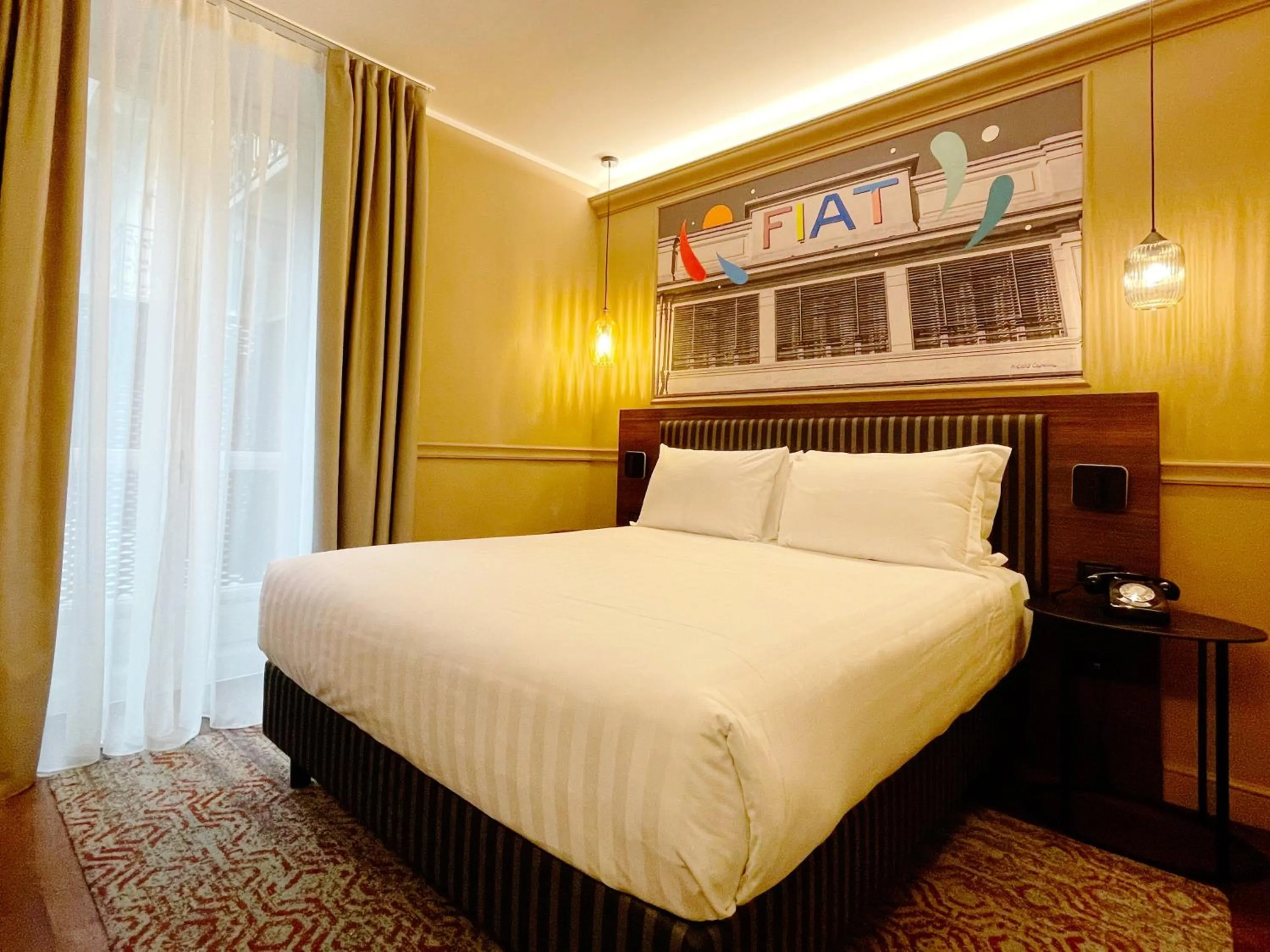 Photo of the whole room, Bed in Hotel Indigo Turin by IHG