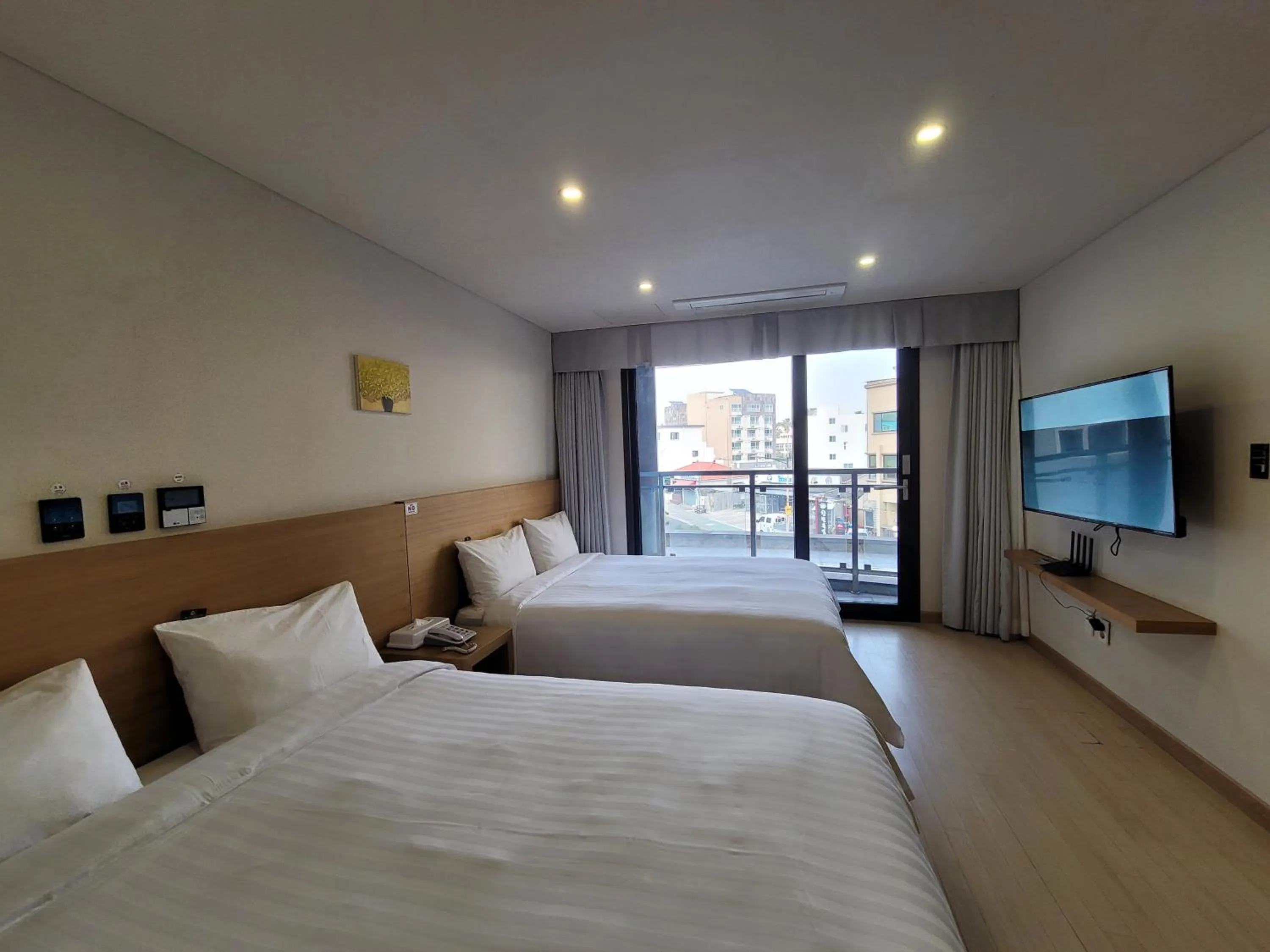 Bed in BK Hotel Jeju