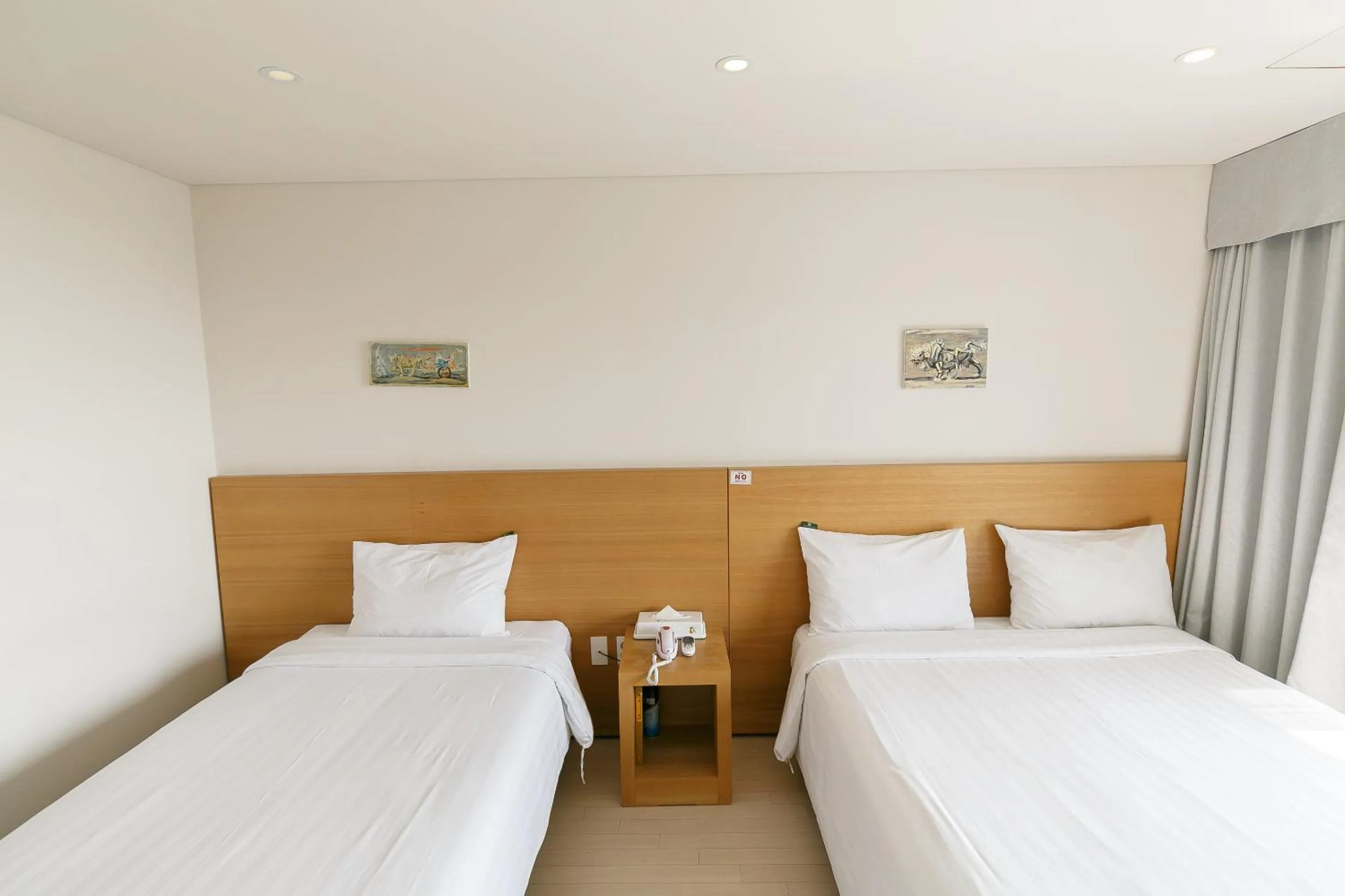 Bed in BK Hotel Jeju