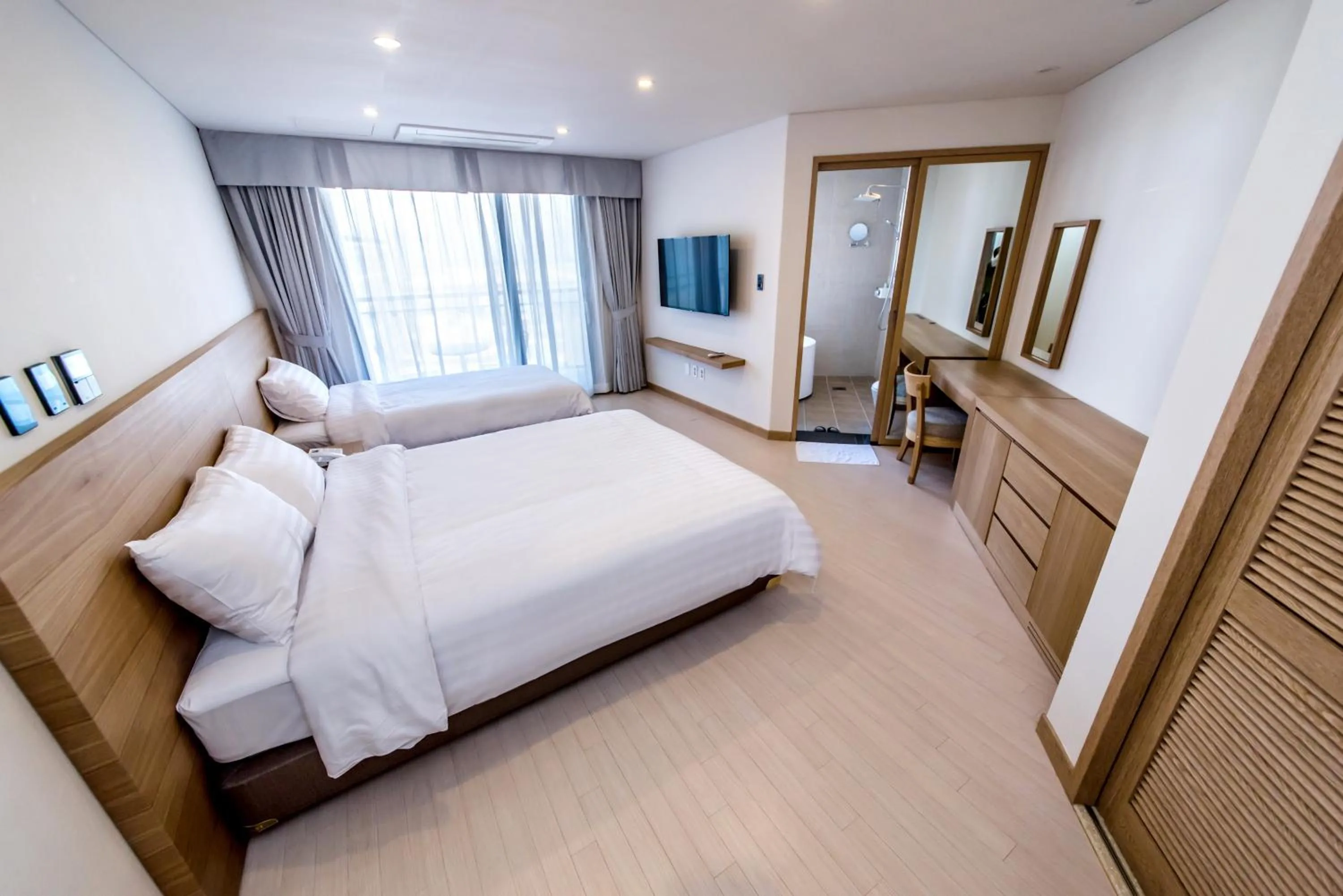 Photo of the whole room, Bed in BK Hotel Jeju