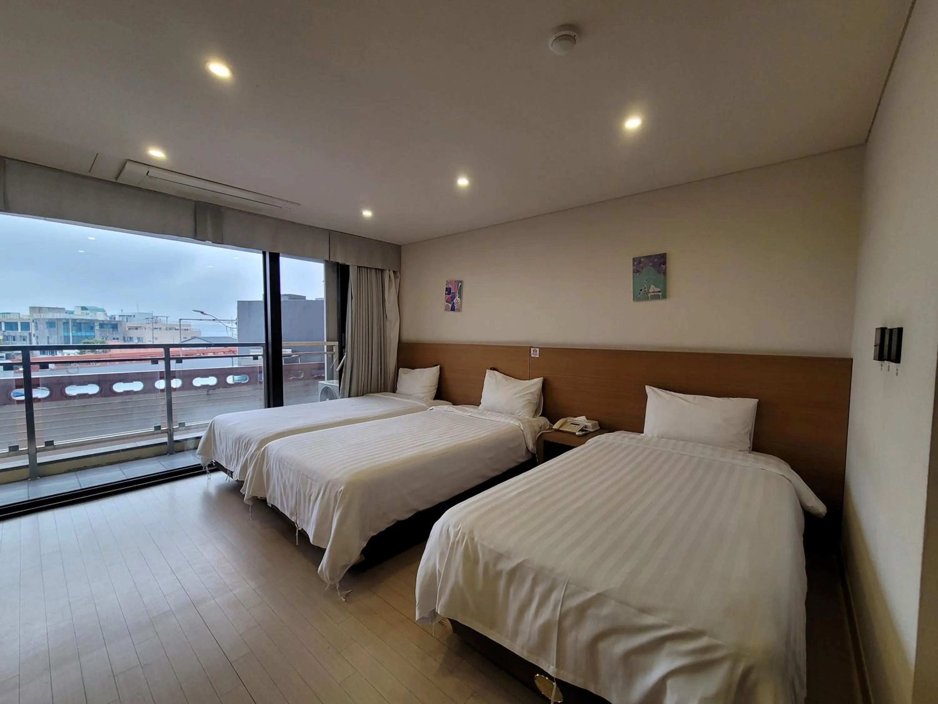 Bed in BK Hotel Jeju