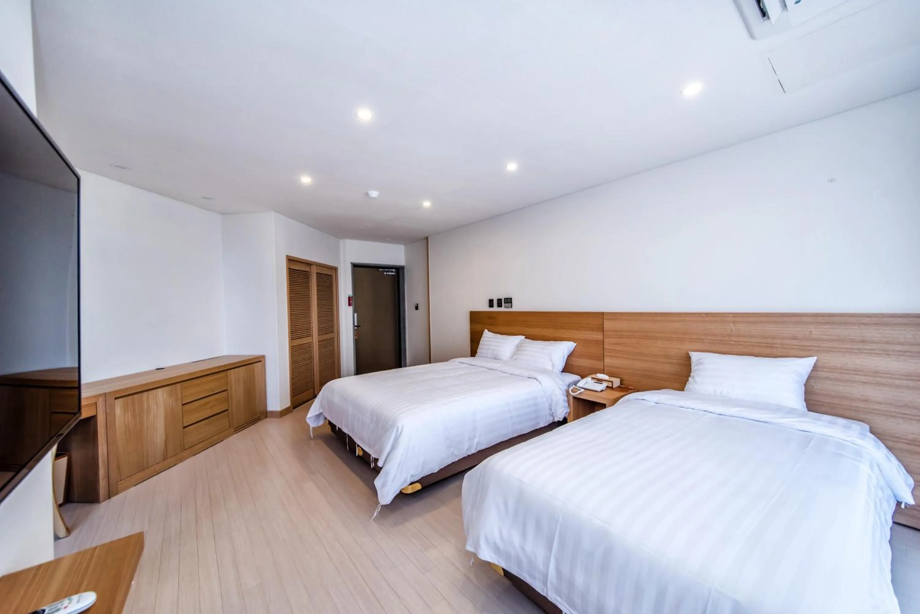 Bed in BK Hotel Jeju