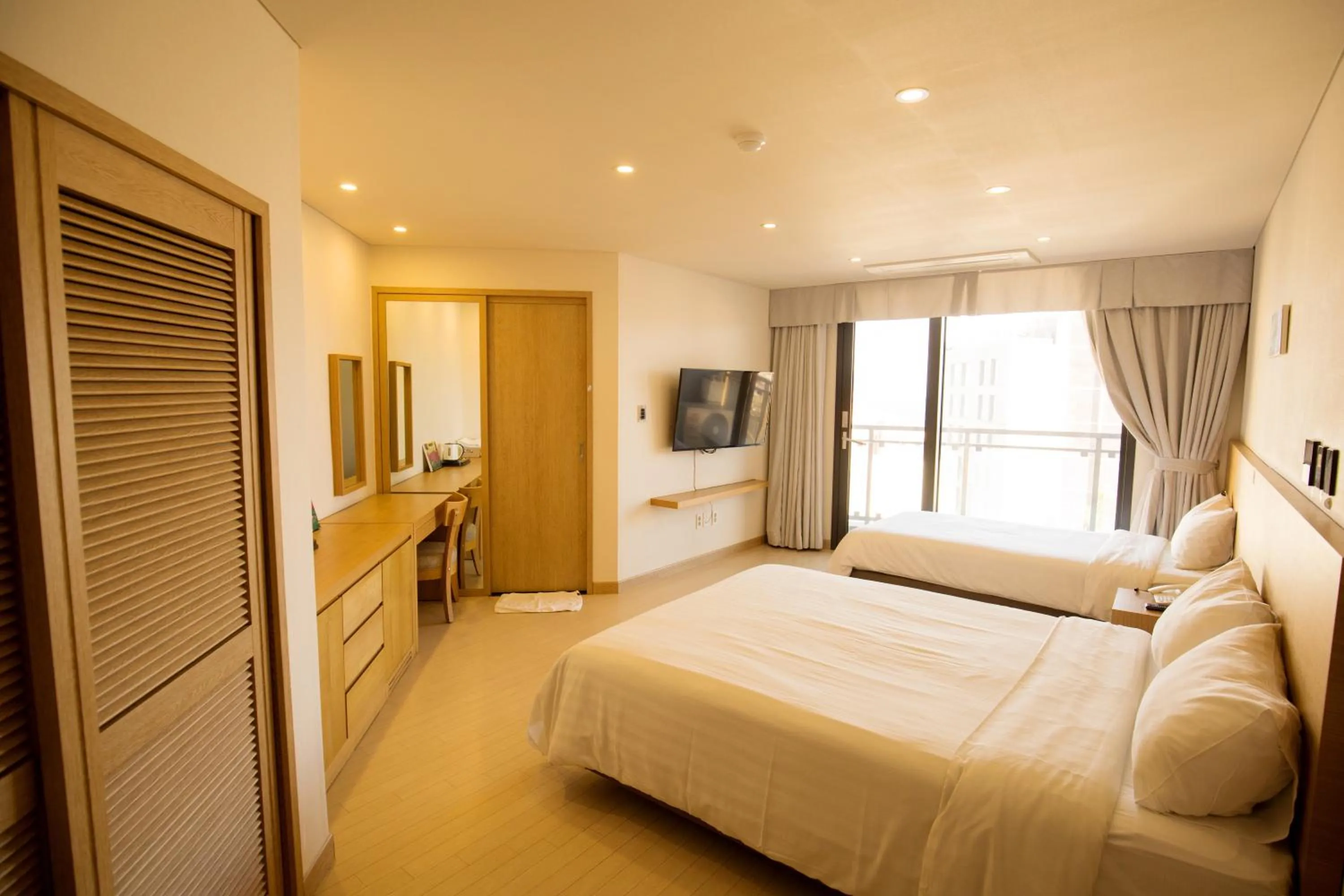 Photo of the whole room, Bed in BK Hotel Jeju