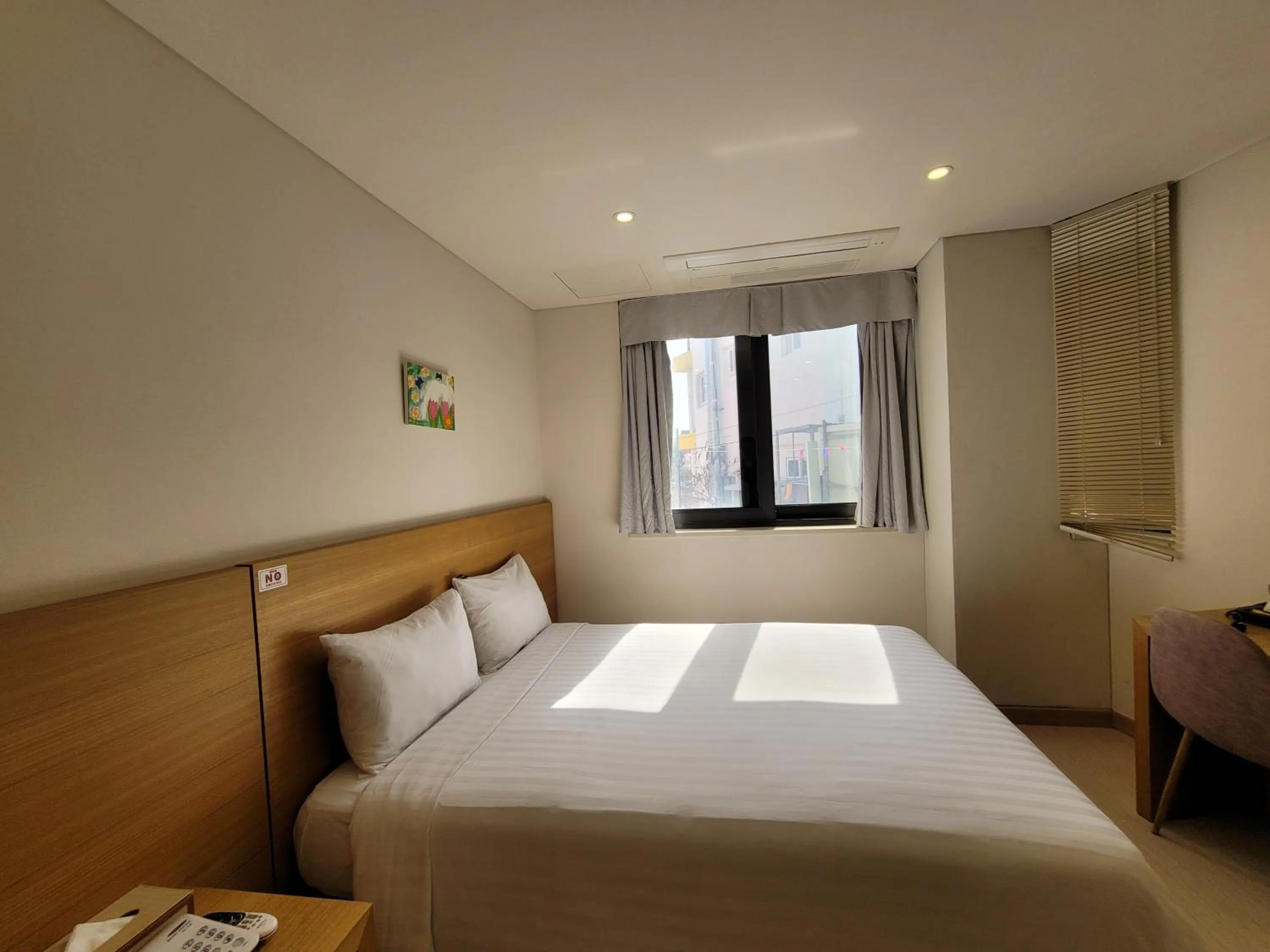 Bed in BK Hotel Jeju