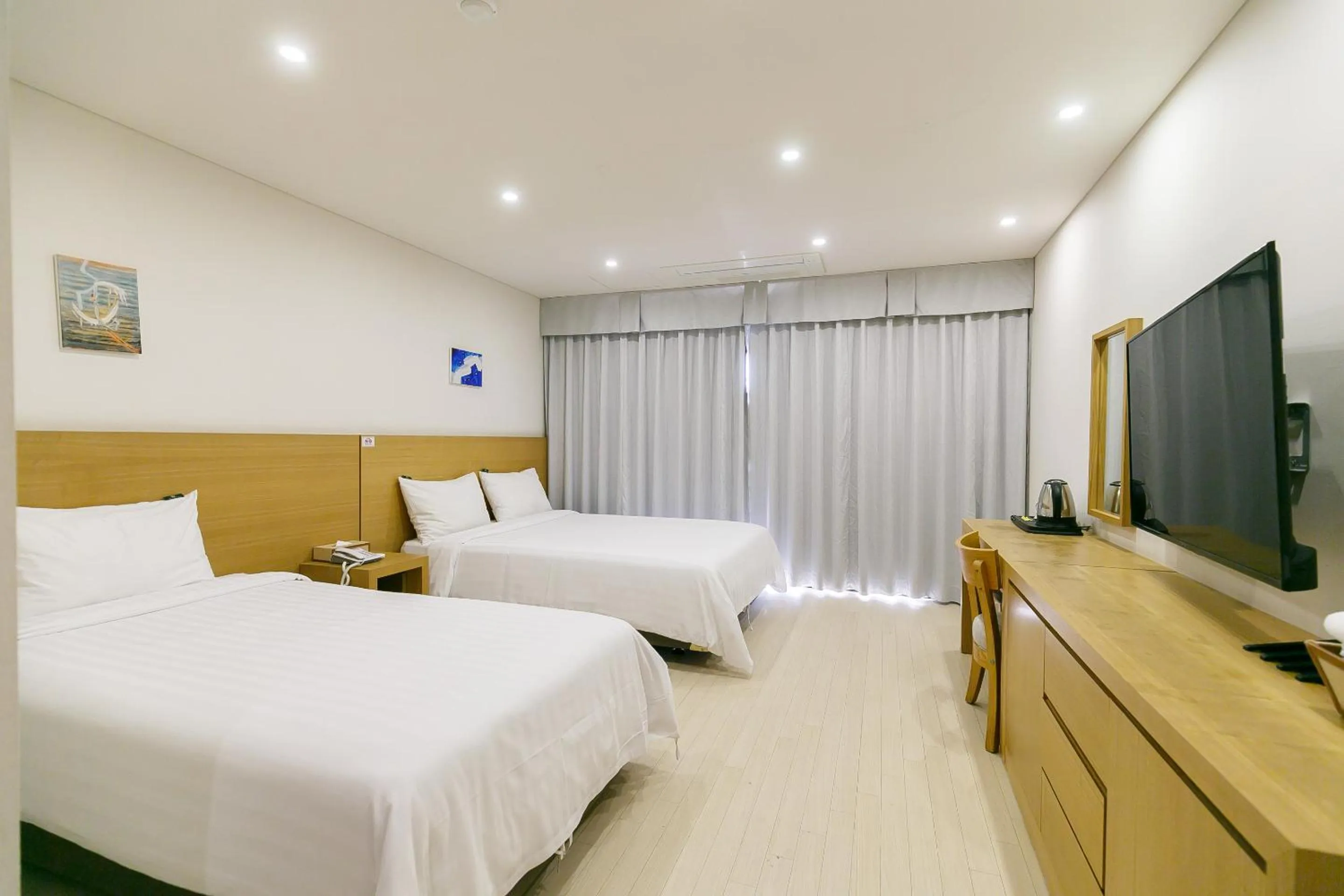 Photo of the whole room, Bed in BK Hotel Jeju