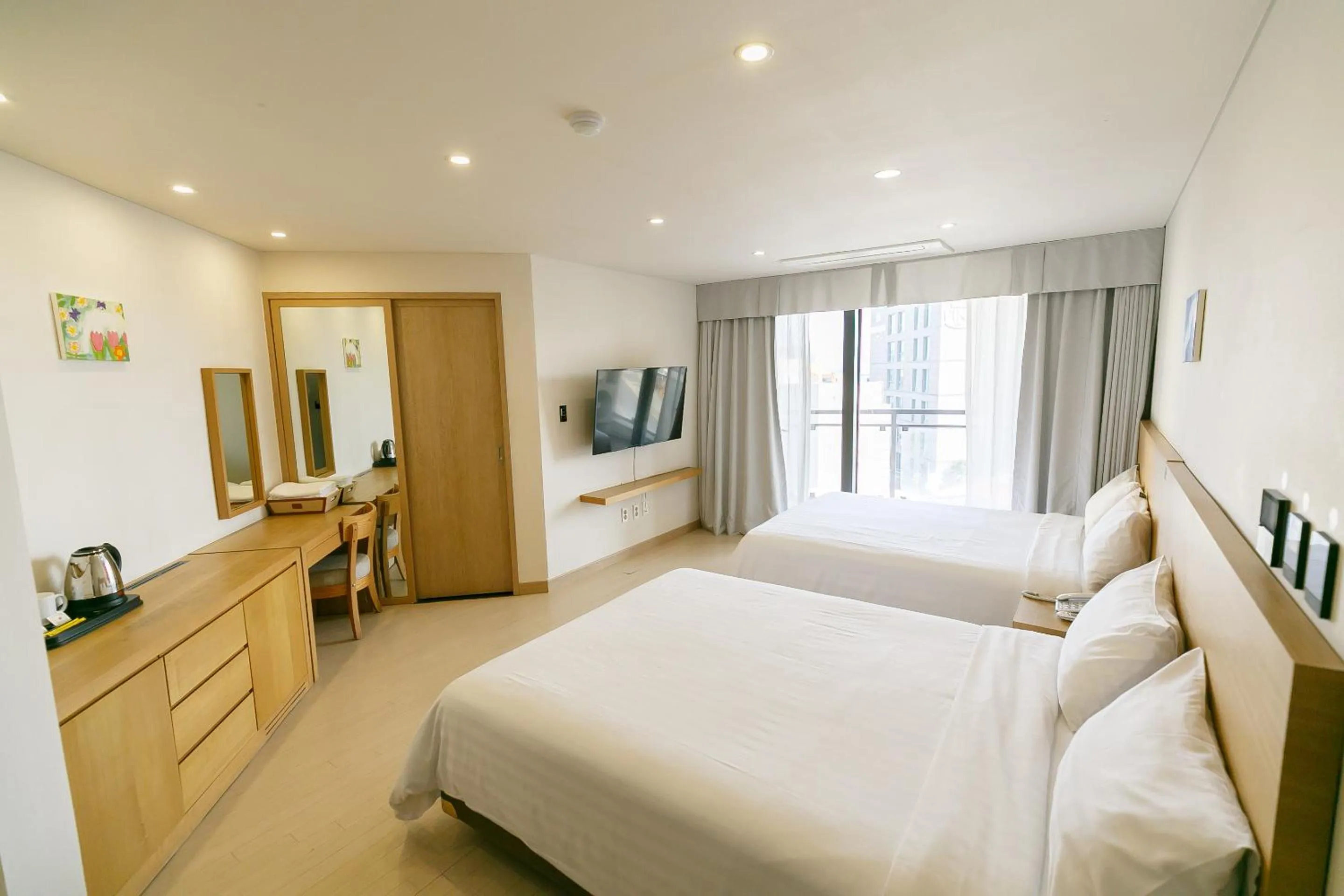 Photo of the whole room, Bed in BK Hotel Jeju
