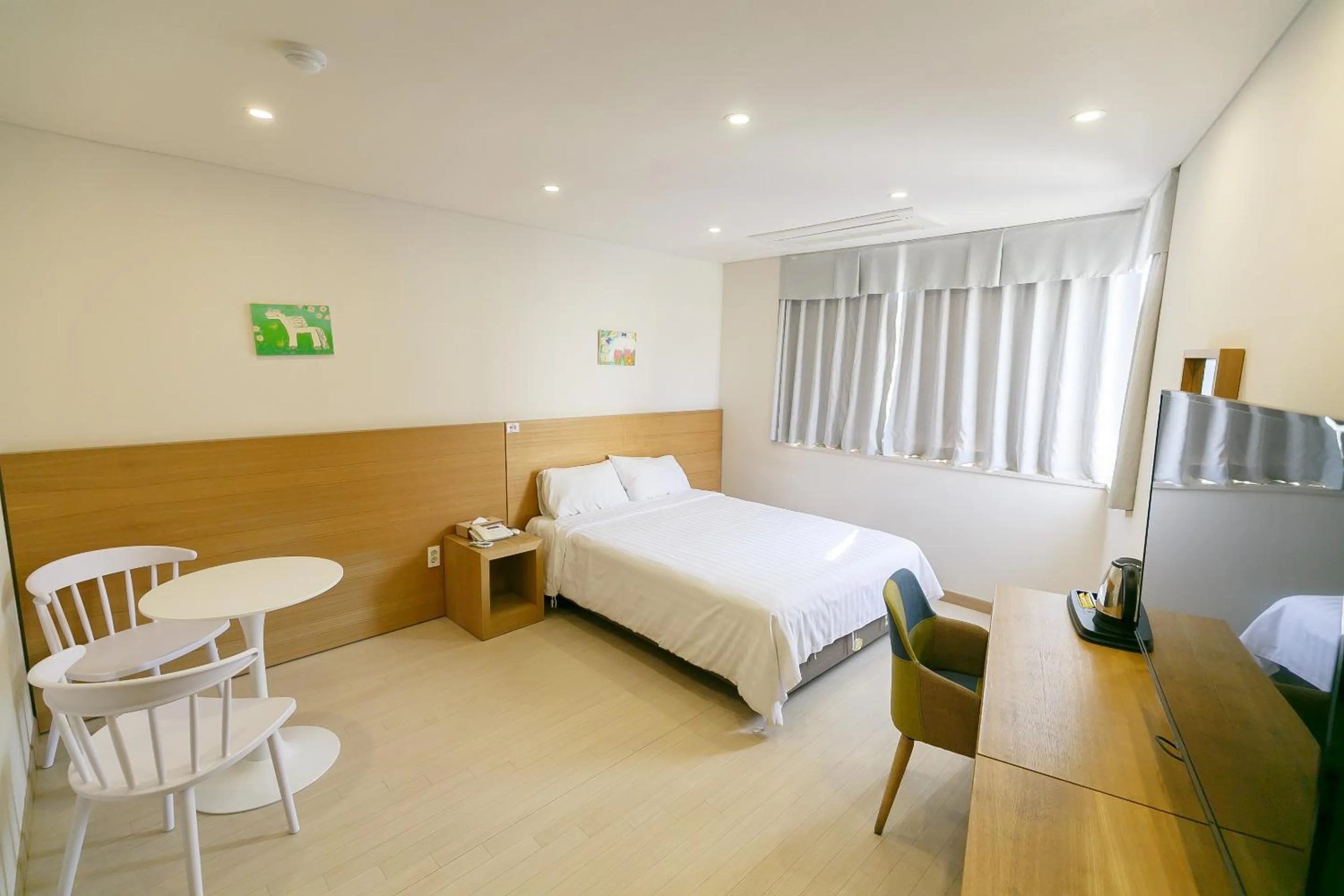 Photo of the whole room, Bed in BK Hotel Jeju