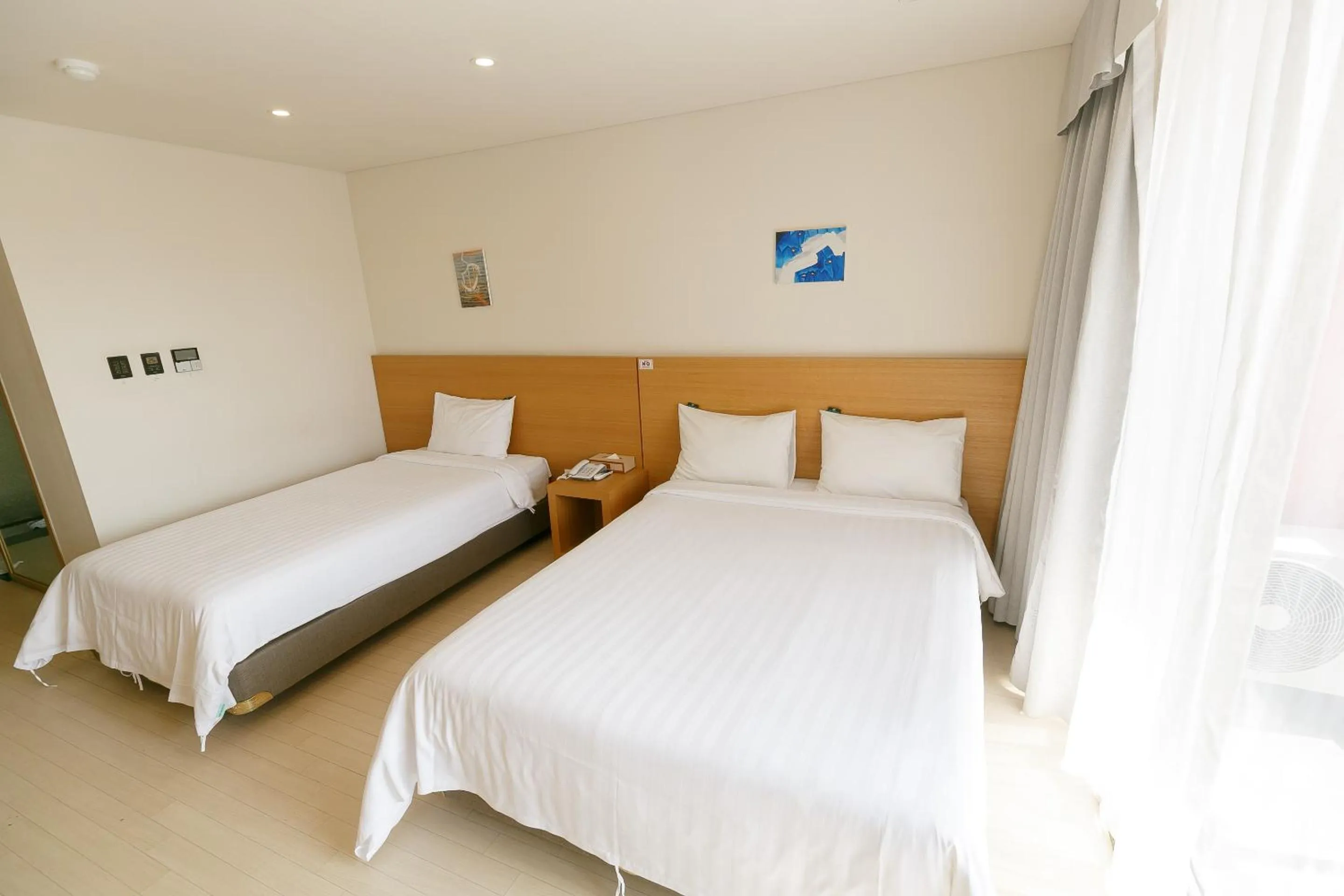 Bed in BK Hotel Jeju