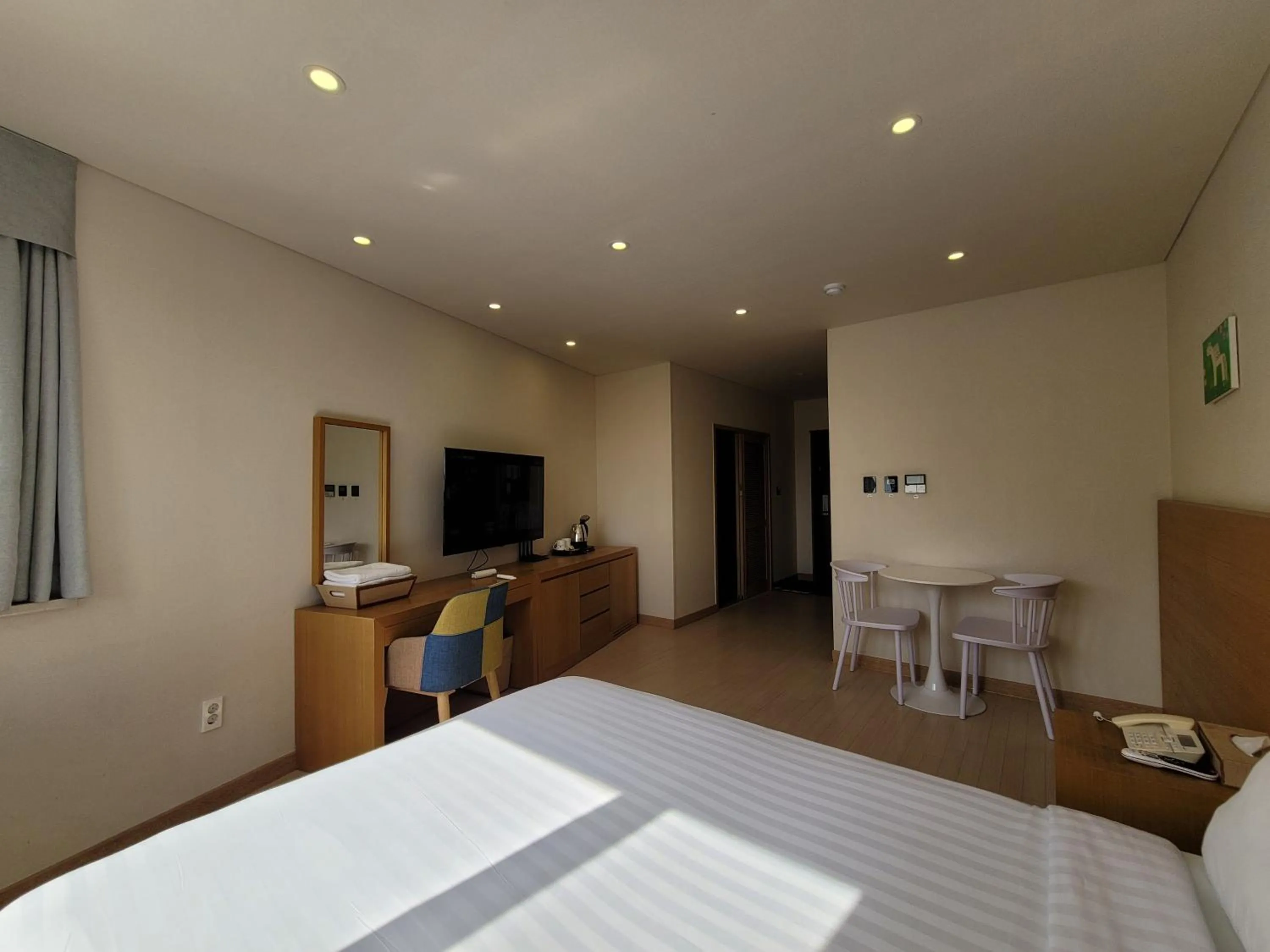 Photo of the whole room, Bed in BK Hotel Jeju