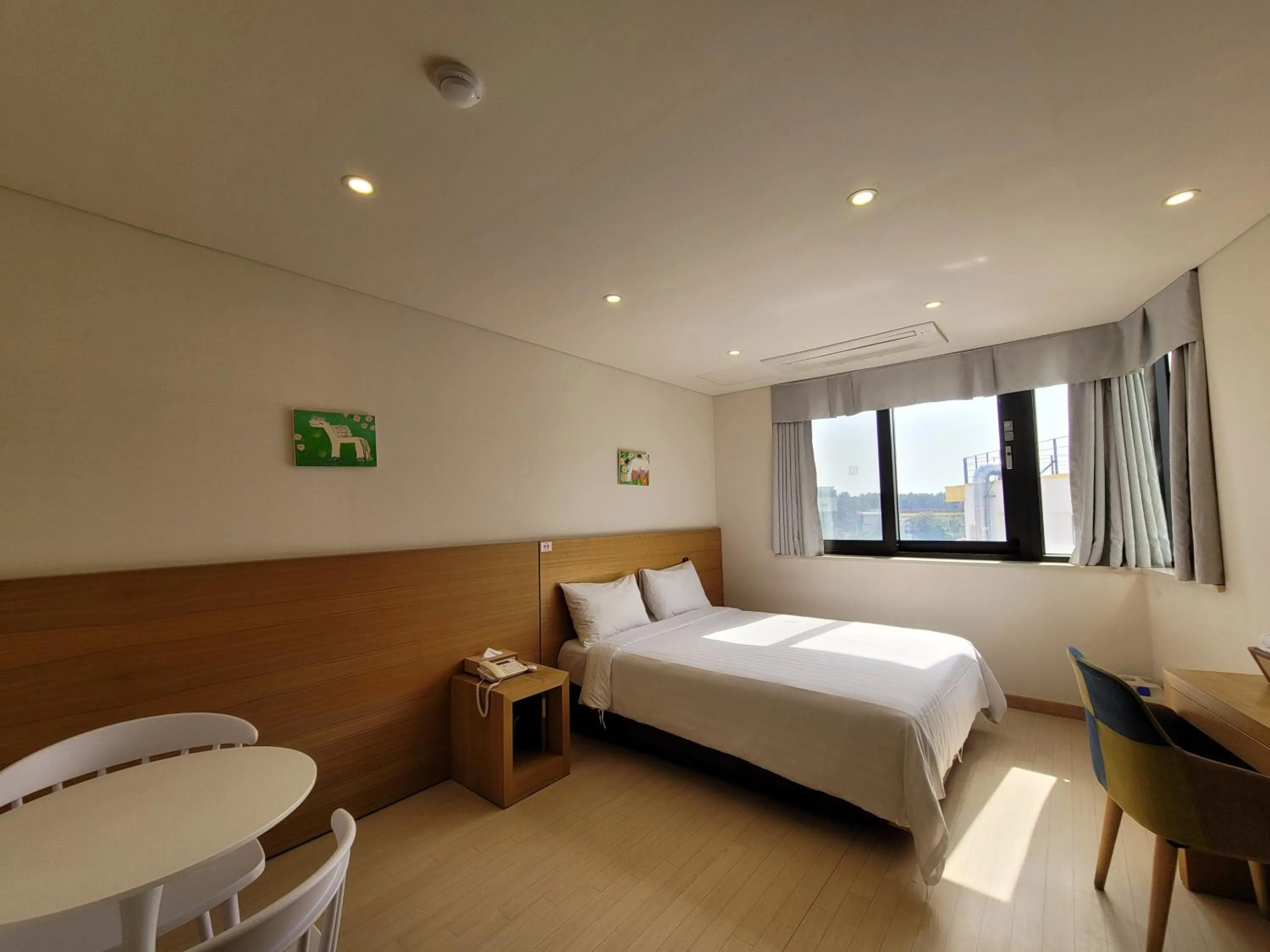 Photo of the whole room, Bed in BK Hotel Jeju