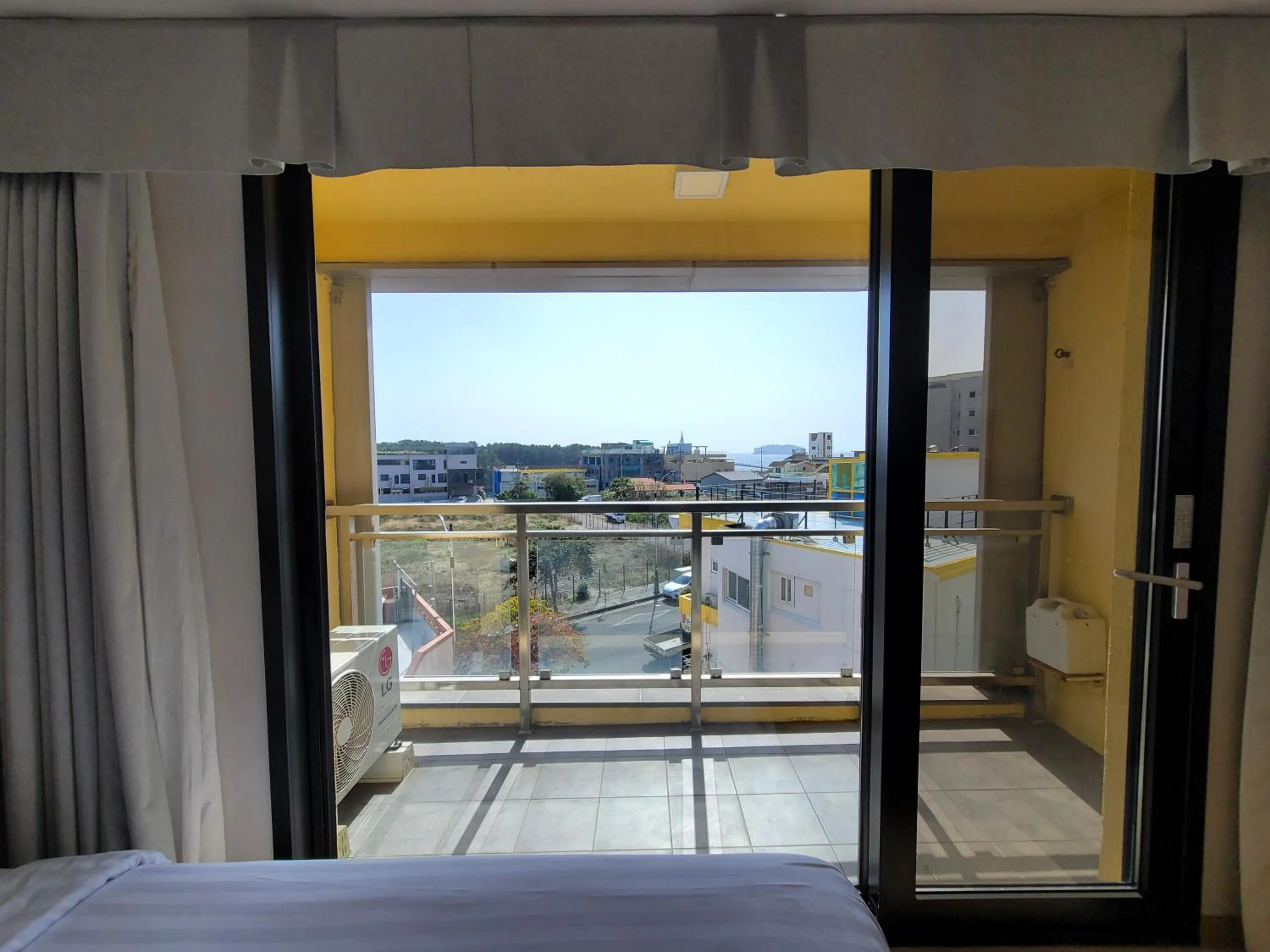 View (from property/room), Bed in BK Hotel Jeju