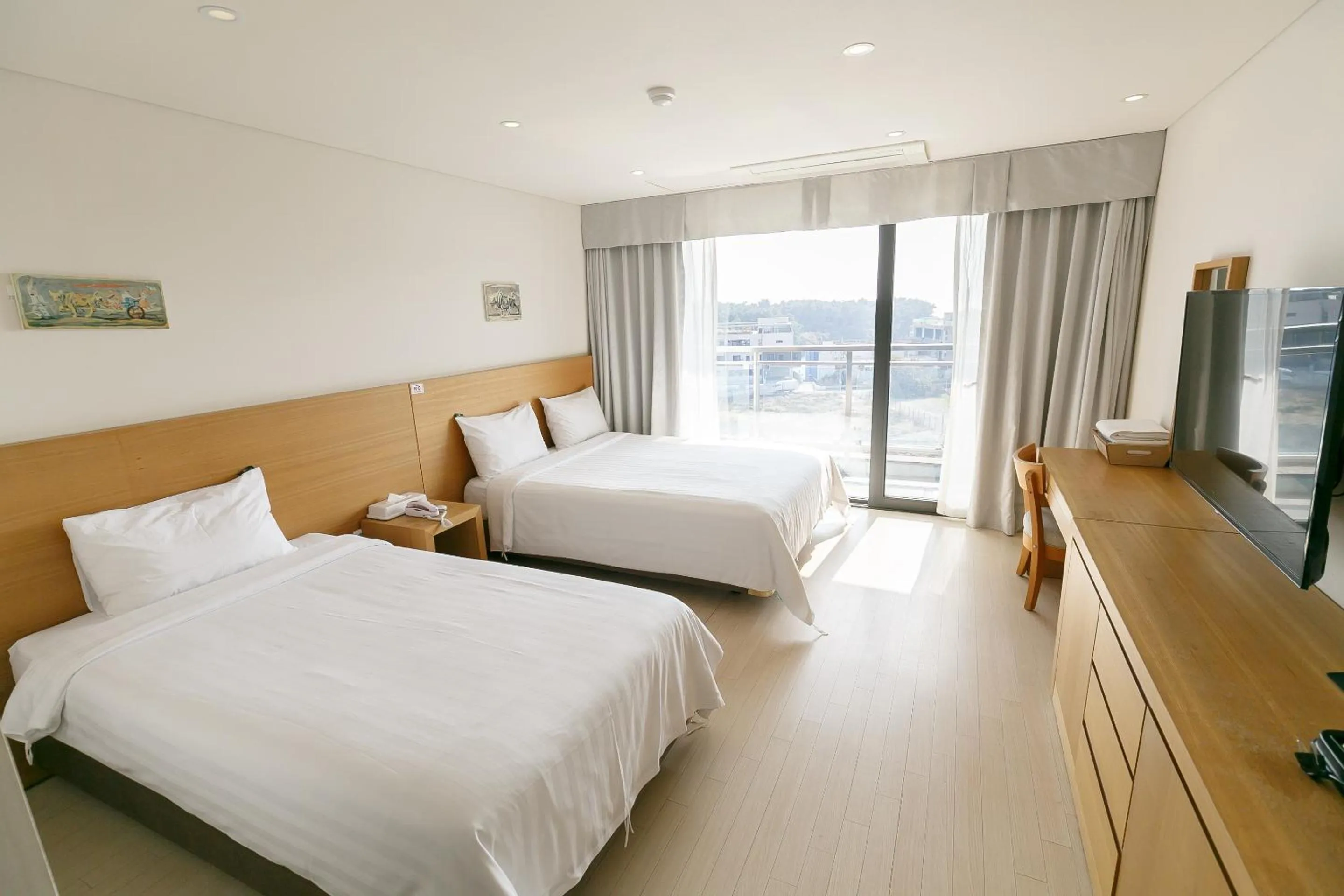 Bed in BK Hotel Jeju