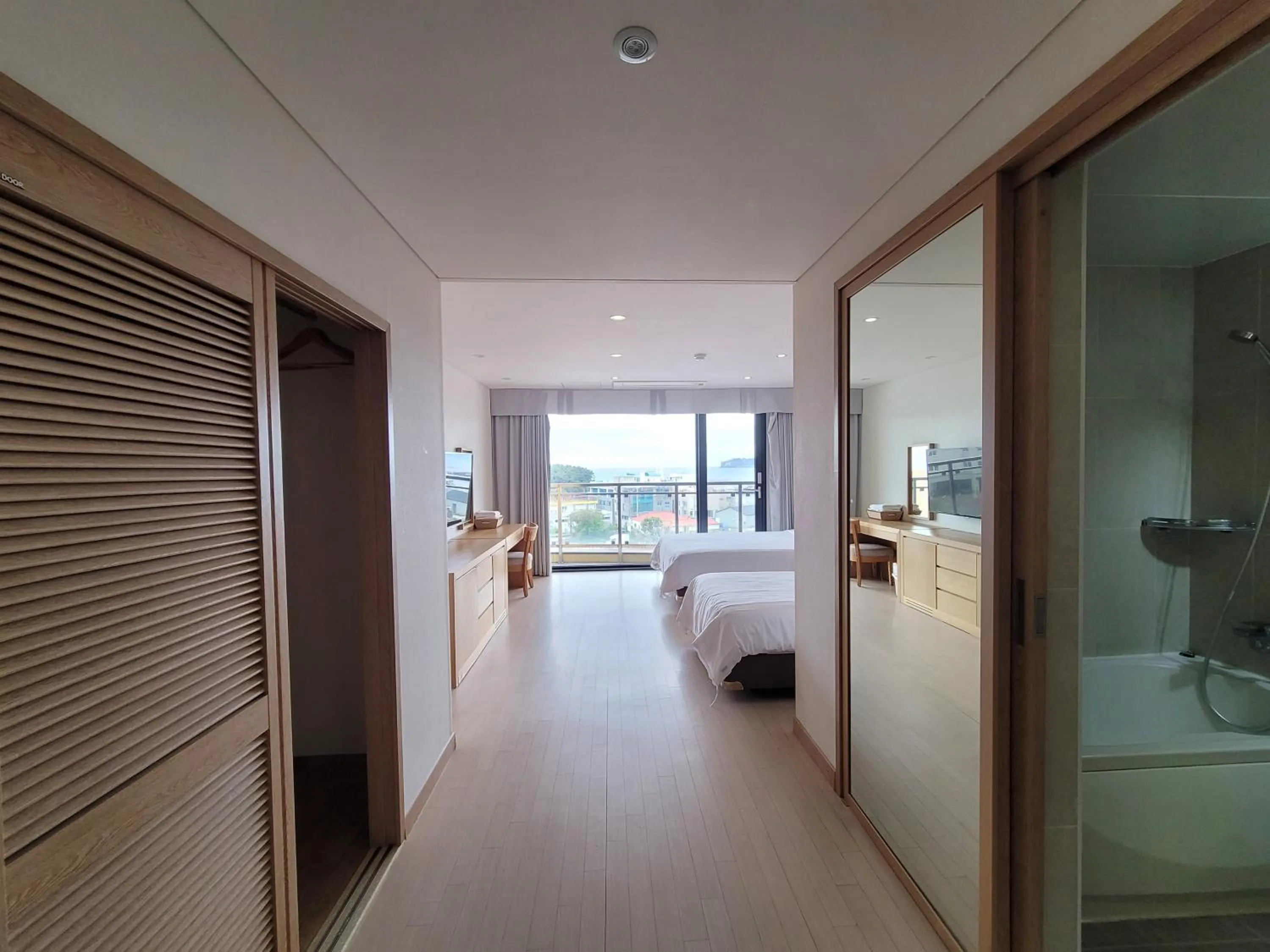 Photo of the whole room, Bed in BK Hotel Jeju