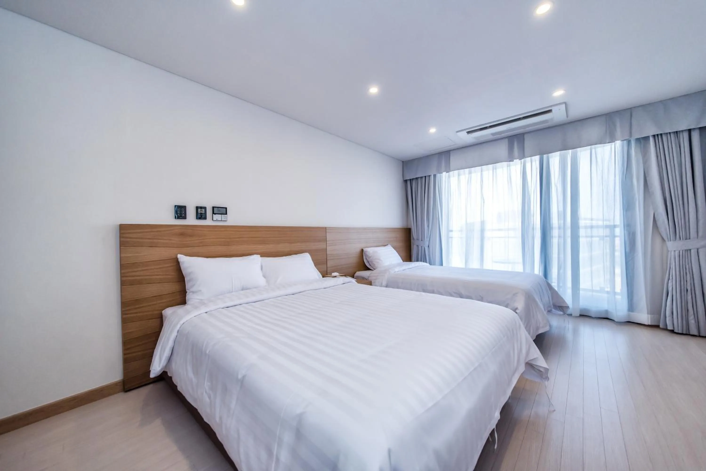 Photo of the whole room, Bed in BK Hotel Jeju
