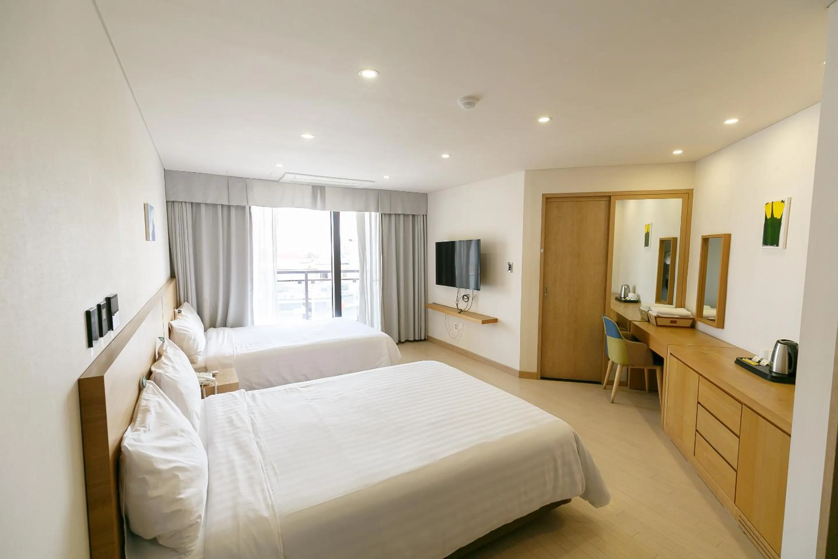 Photo of the whole room, Bed in BK Hotel Jeju